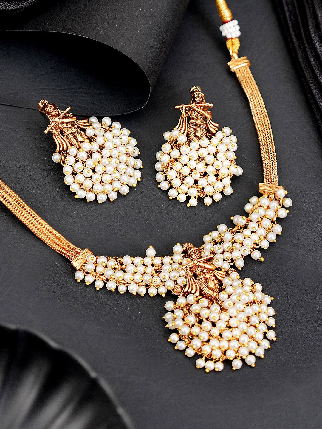 

Saraf RS Jewellery Gold-Plated Faux Pearls Beaded Shri Krishna Motif Temple Jewellery Set