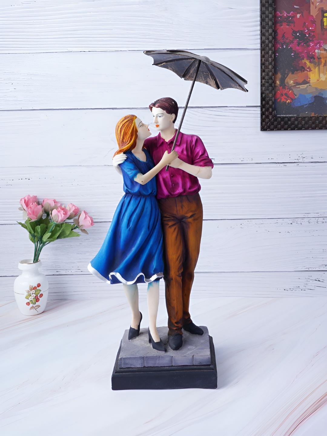 

FASHIYANOO Red & Blue Umbrella Couple Figurine Showpiece