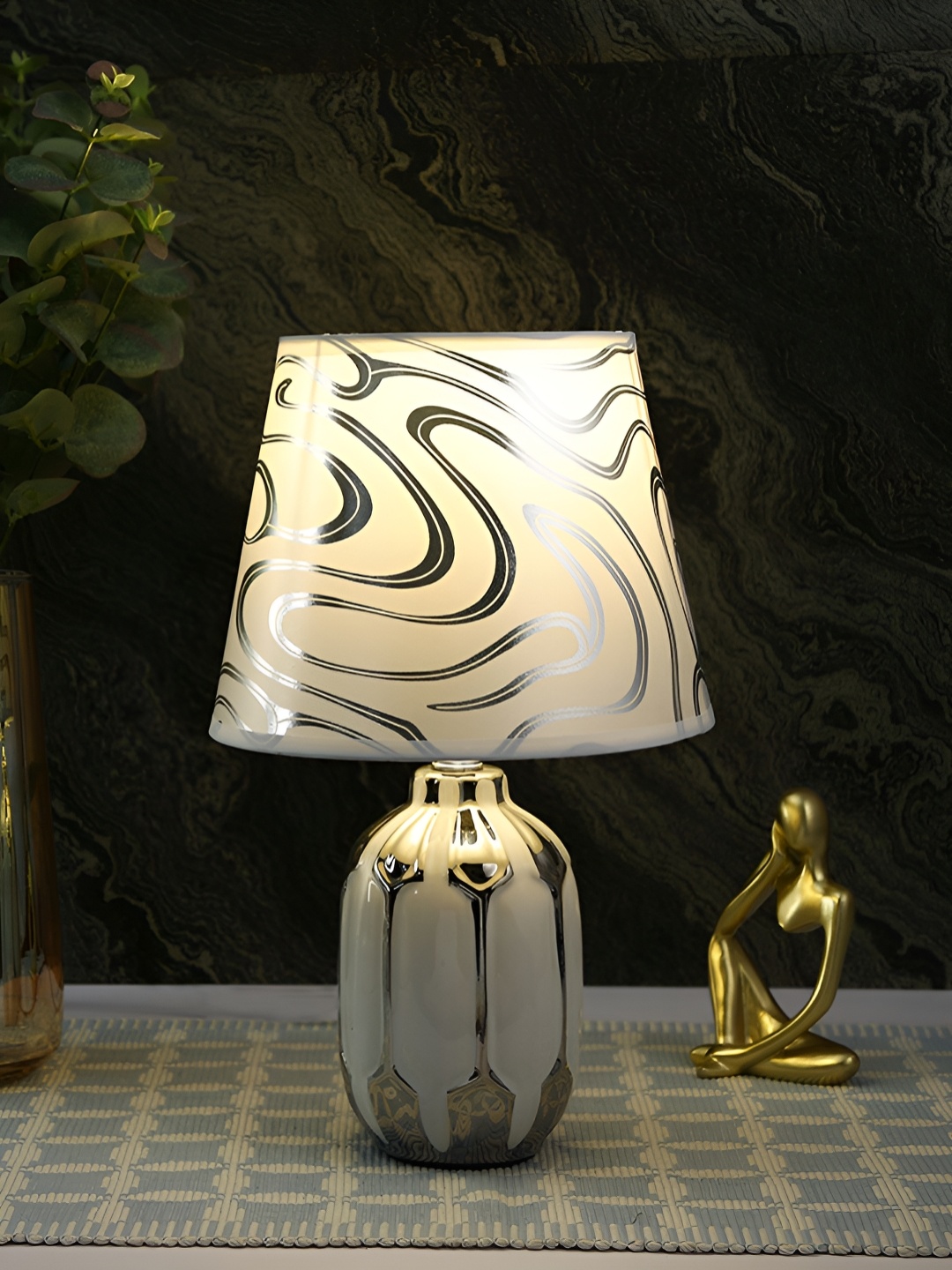 

TAYHAA White & Silver-toned Textured Ceramic Contemporary Frusturical Shaped Table Lamp