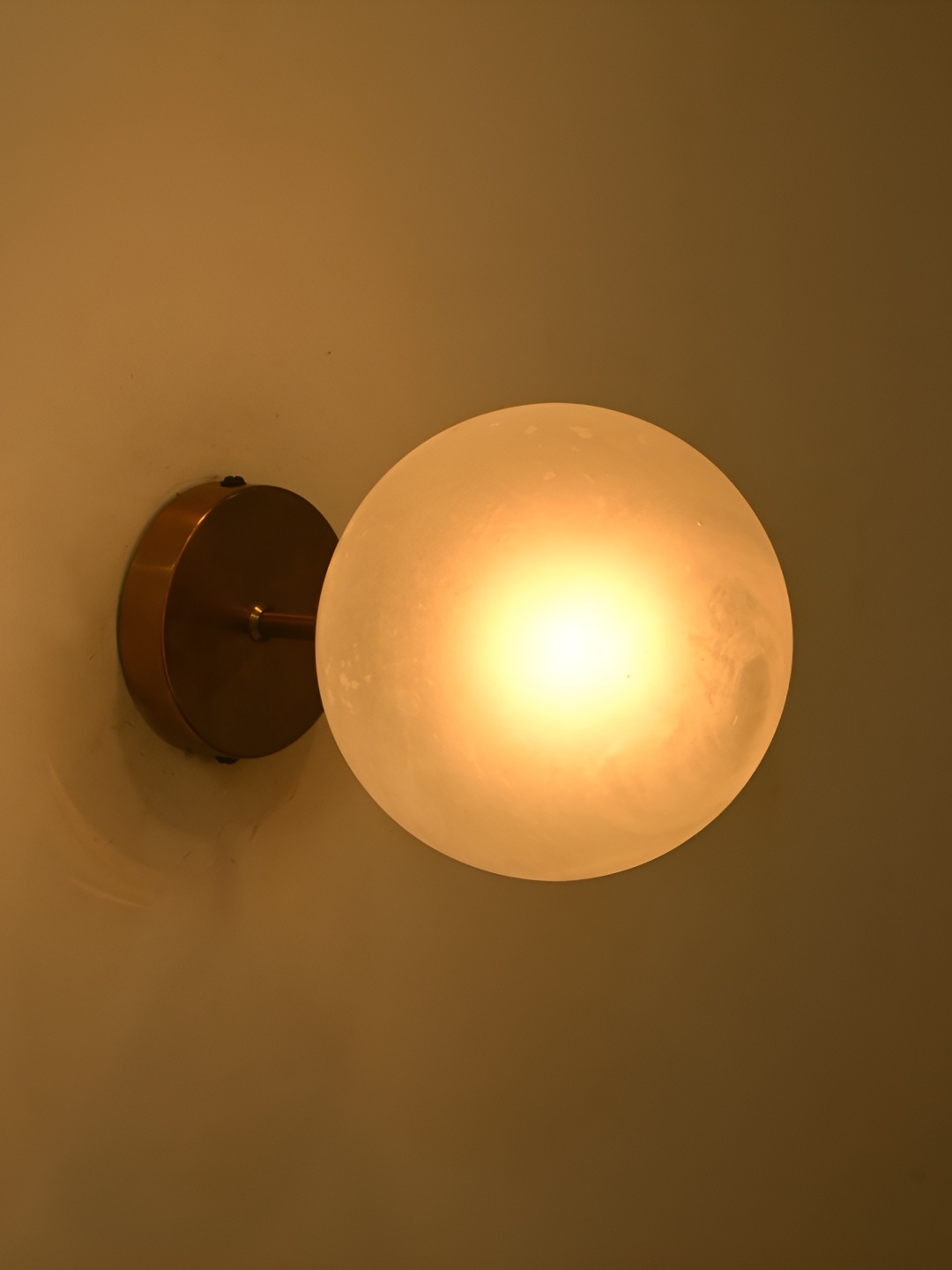 

Afast White Glass Traditional Spherical Shaped Wall Lamp