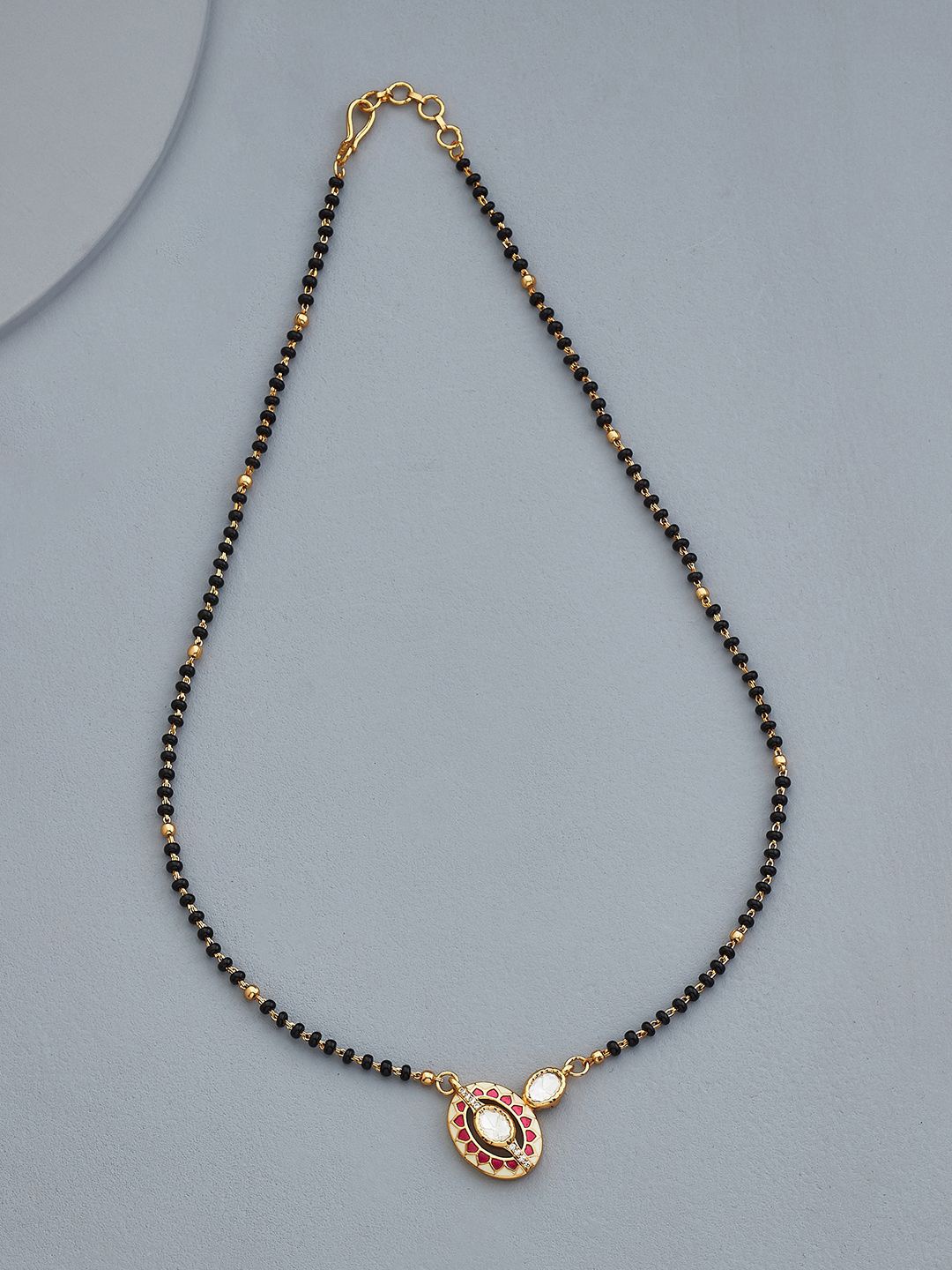 

Kushal's Fashion Jewellery Gold-Plated Kundan Studded and Beaded Mangalsutra