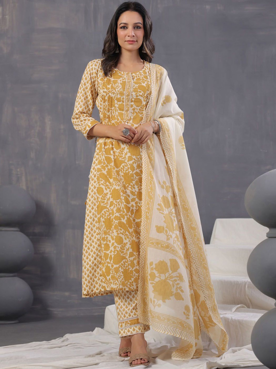 

Meena Bazaar Ethnic Motifs Printed Pleated Thread Work Kurta with Trousers & Dupatta, Mustard