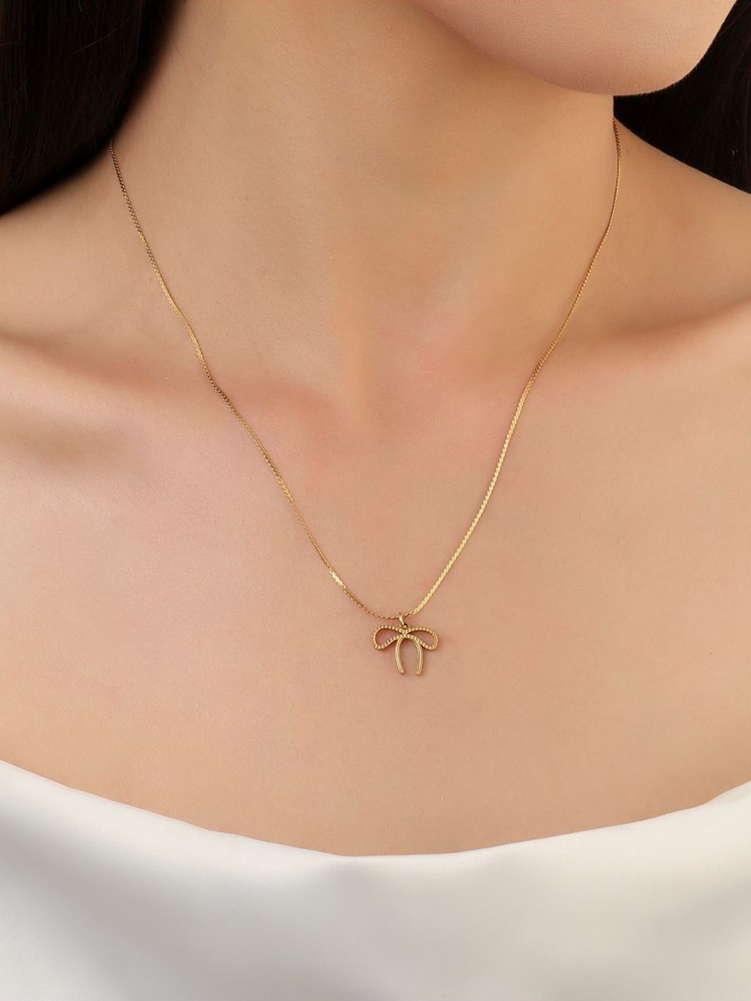 

SALTY Gold Plated Bow Pendant With Necklace