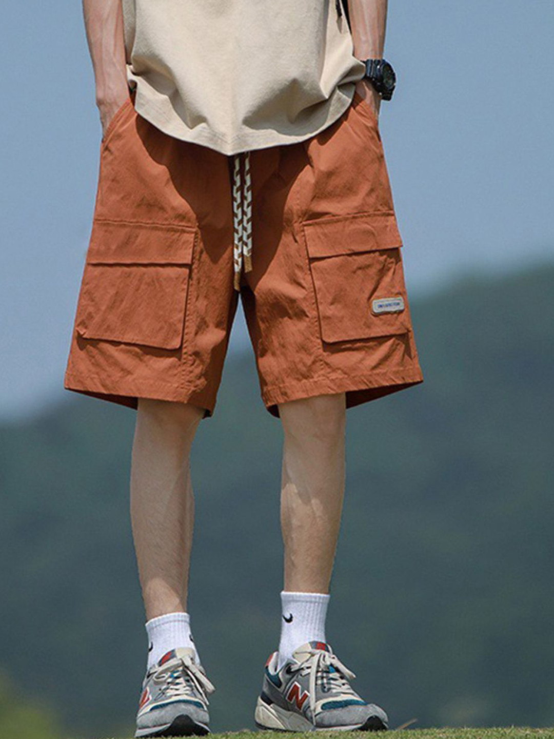 

StyleCast Men Casual Mid-Rise Solid Loose Fit Shorts, Orange