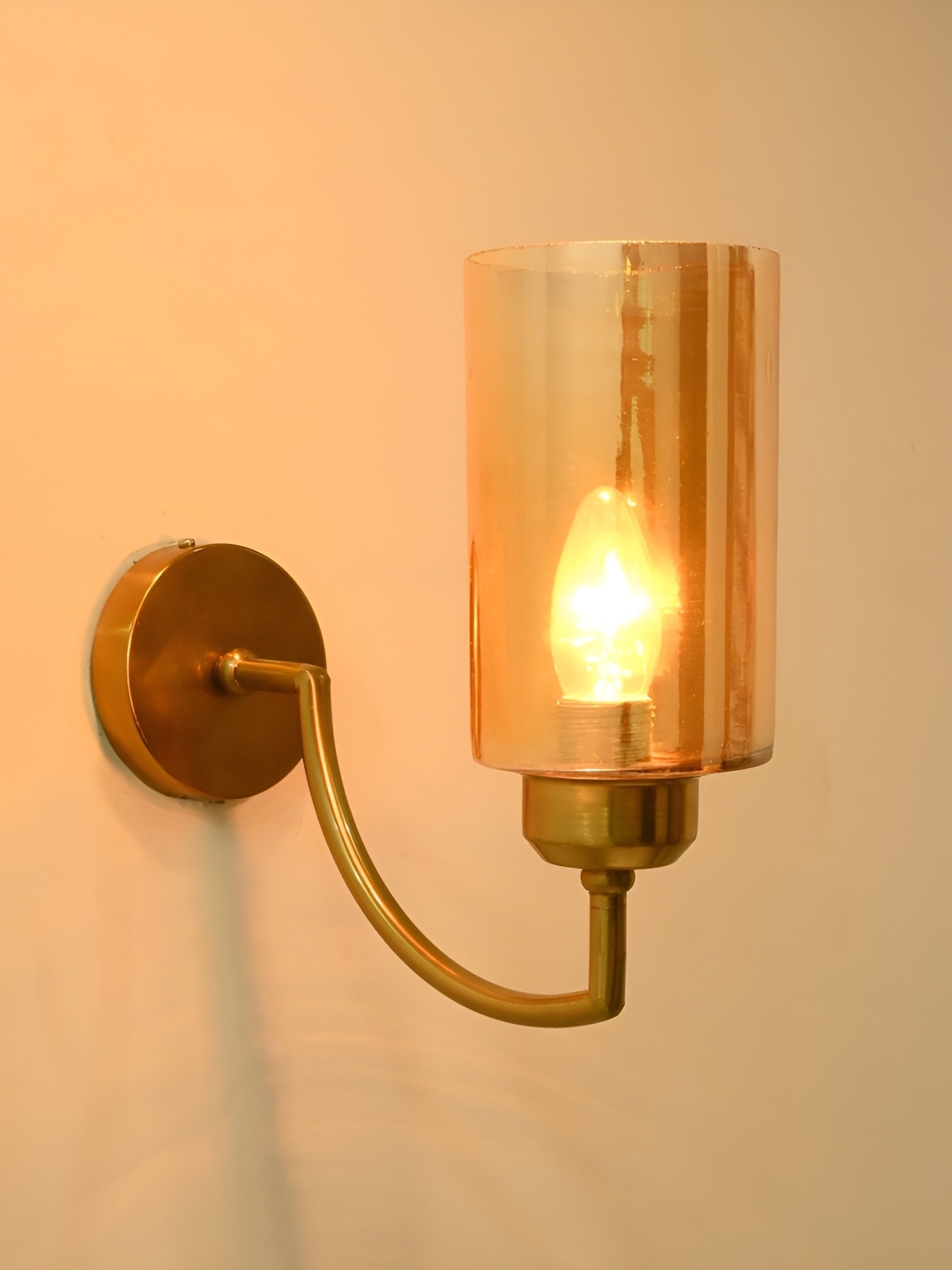 

Afast Gold Toned Glass Contemporary Cylinder Shaped Wall Lamp