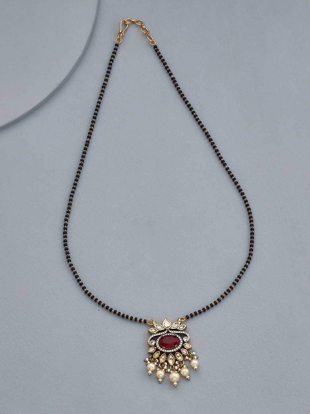 

Kushal's Fashion Jewellery Gold-Plated Kundan Studded and Beaded Mangalsutra