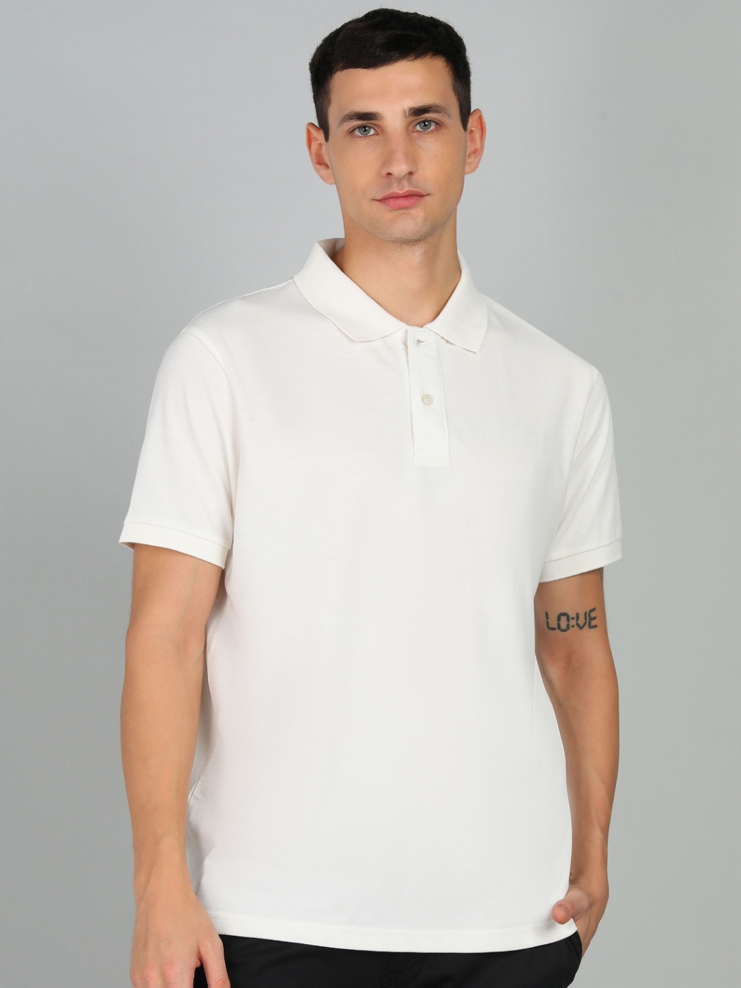 

Alan Jones Men Solid Polo Collar Cotton T-shirt, White