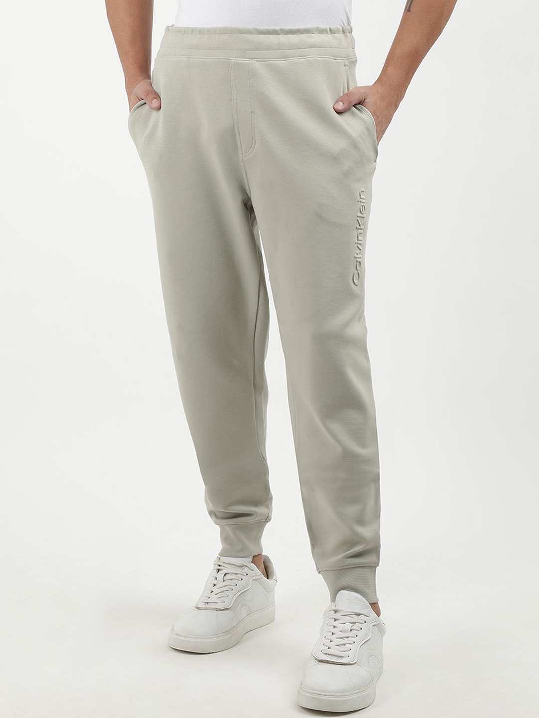 

Calvin Klein Jeans Men Mid-Rise Solid Joggers, Beige