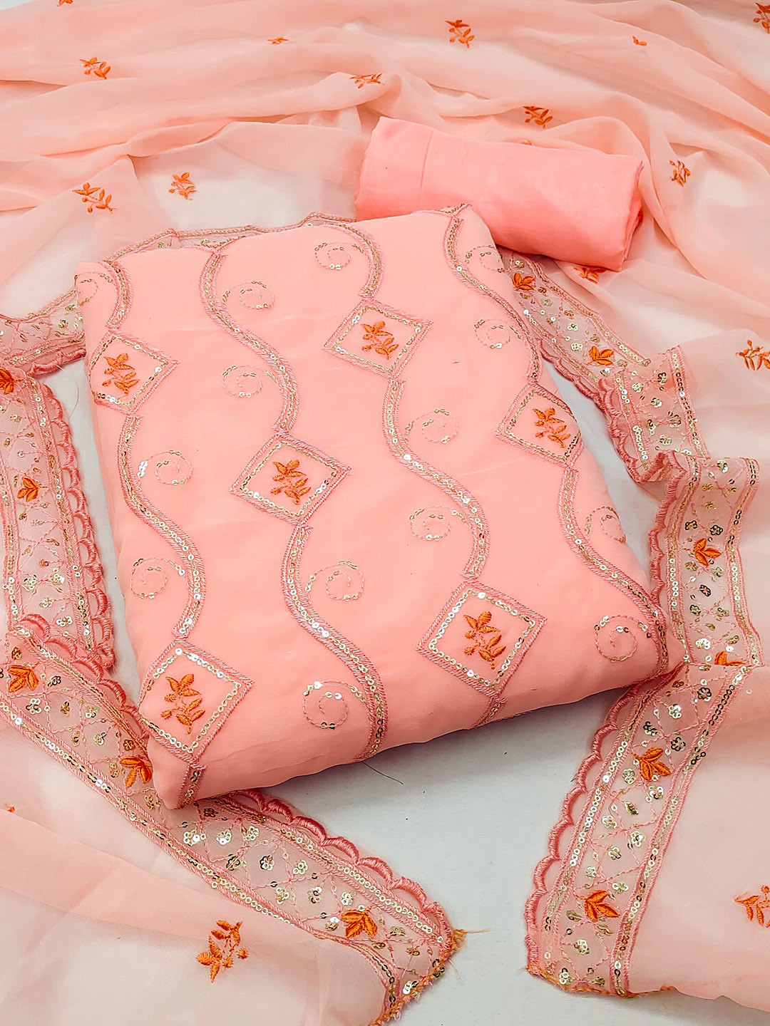 

Ishin Floral Embroidered Silk Georgette Unstitched Dress Material, Peach