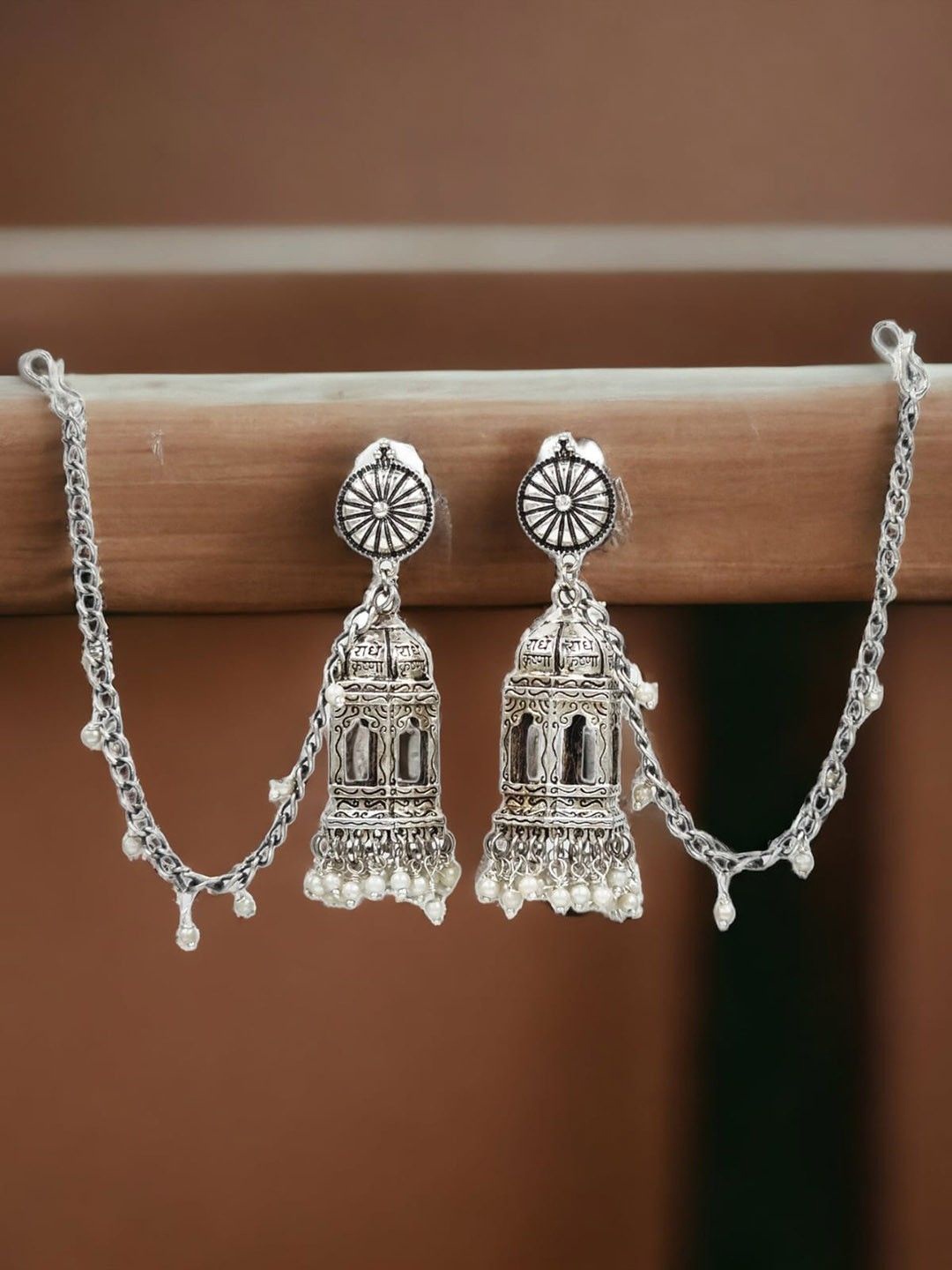 

FIMBUL Silver-Plated Pearl Beaded Classic Oxidised Jhumkas With Chain