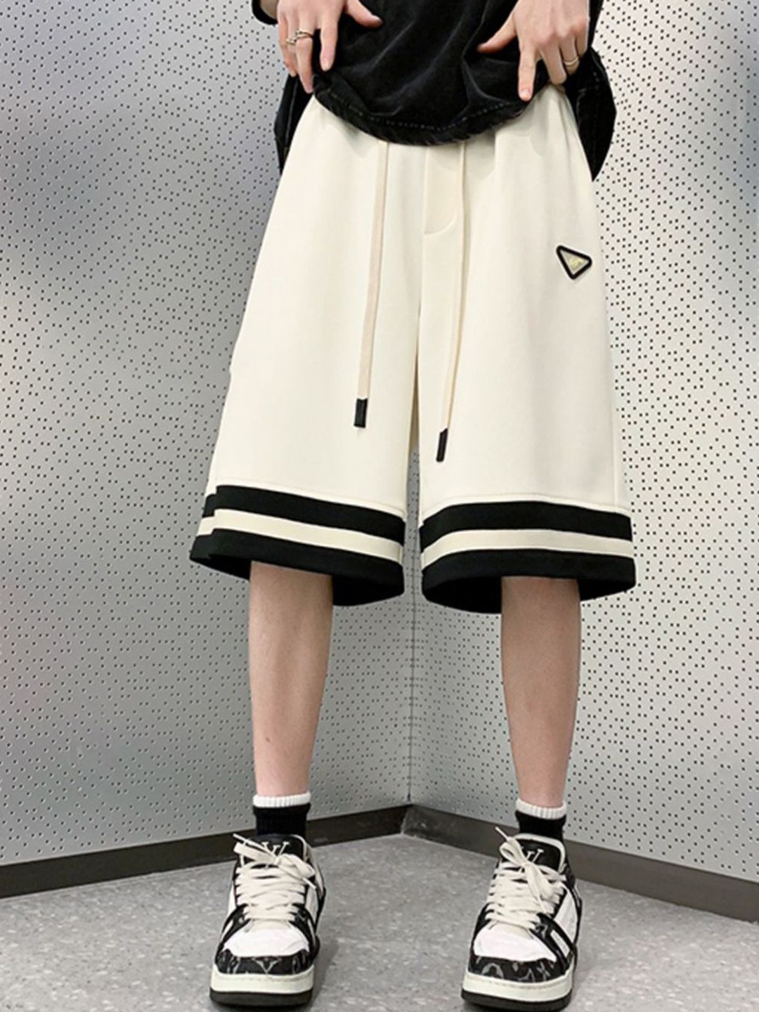 

StyleCast Men Solid Loose Fit Mid-Rise Sports Shorts, Off white