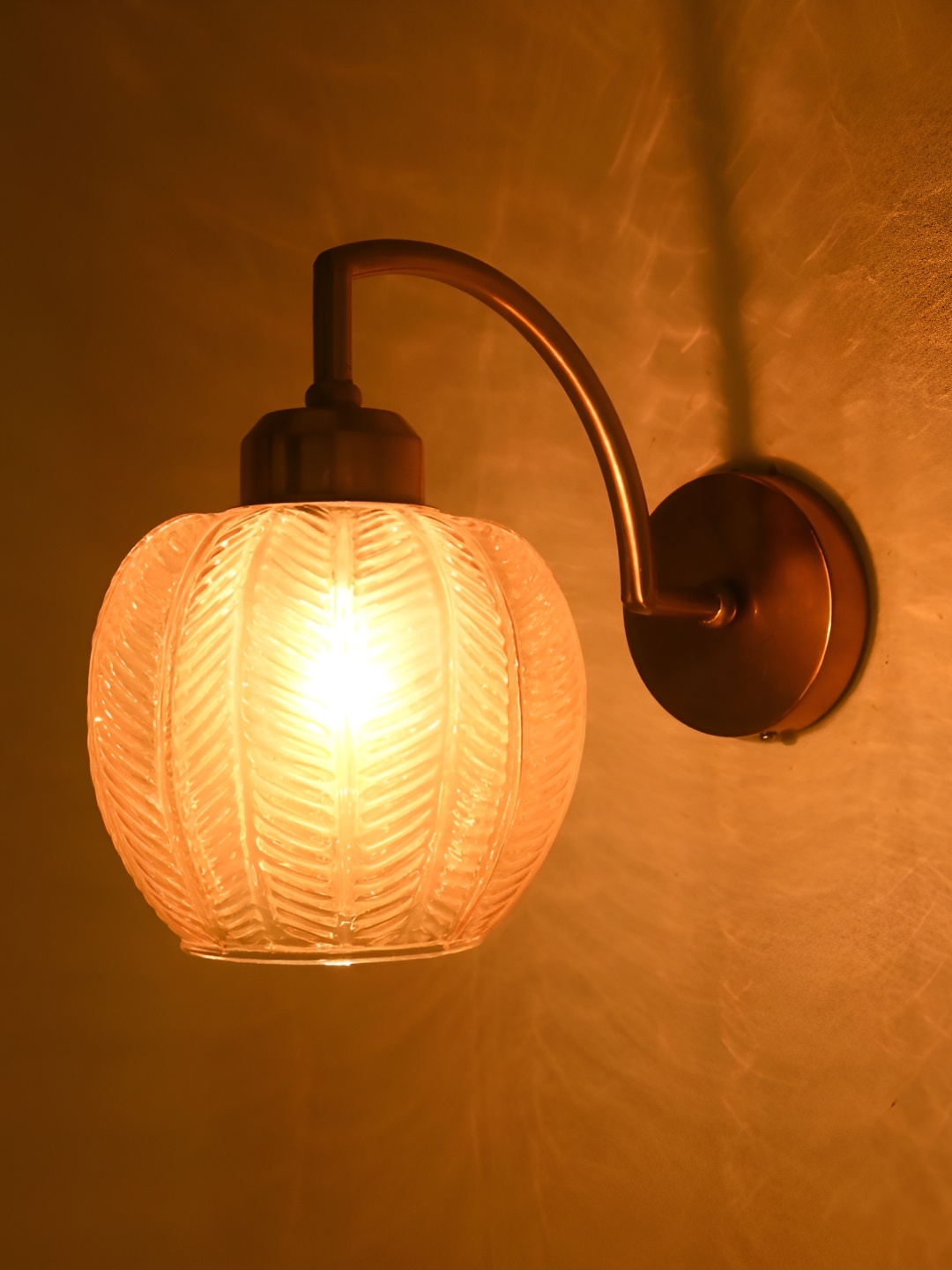 

Afast Gold Toned & Brown Textured Glass Contemporary Cylinder Shaped Wall Lamp