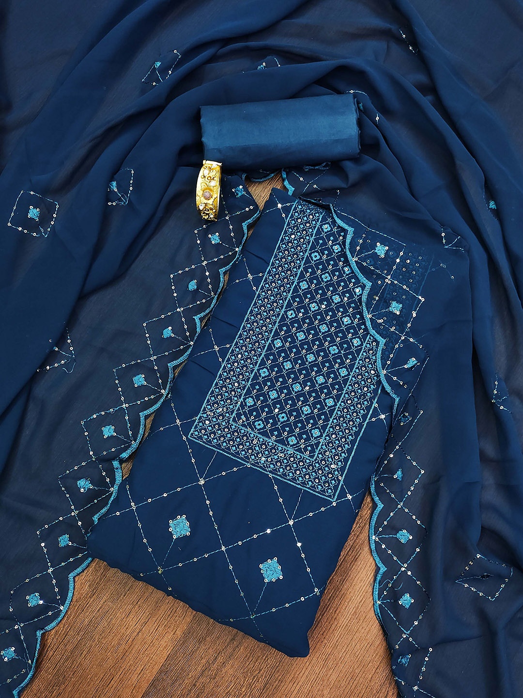 

Ishin Ethnic Motifs Embroidered Silk Georgette Unstitched Dress Material, Teal