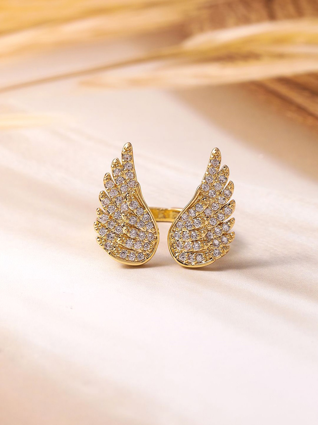 

Rubans 18K Gold Plated Cubic Zirconia Studded Openable Wing Design Finger Ring