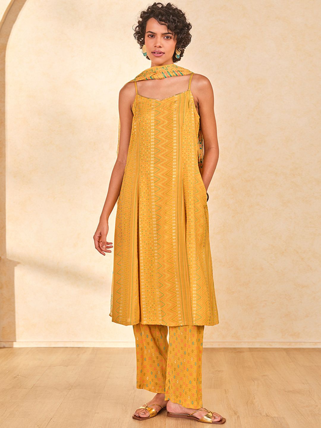 

Global Desi Geometric Printed Shoulder Straps A-Line Kurta with Trousers & With Dupatta, Mustard