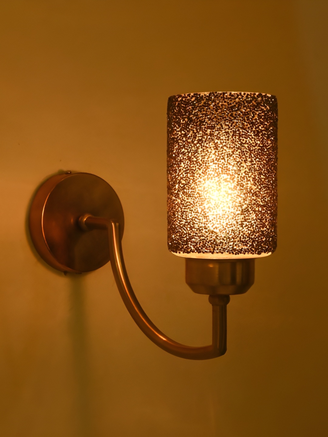 

Afast Black & Gold Toned Textured Glass Contemporary Cylinder Shaped Wall Lamp