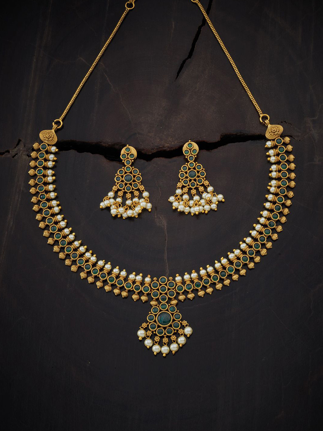 

Kushal's Fashion Jewellery Gold-Plated Stone Studded & Beaded Antique Jewellery Set