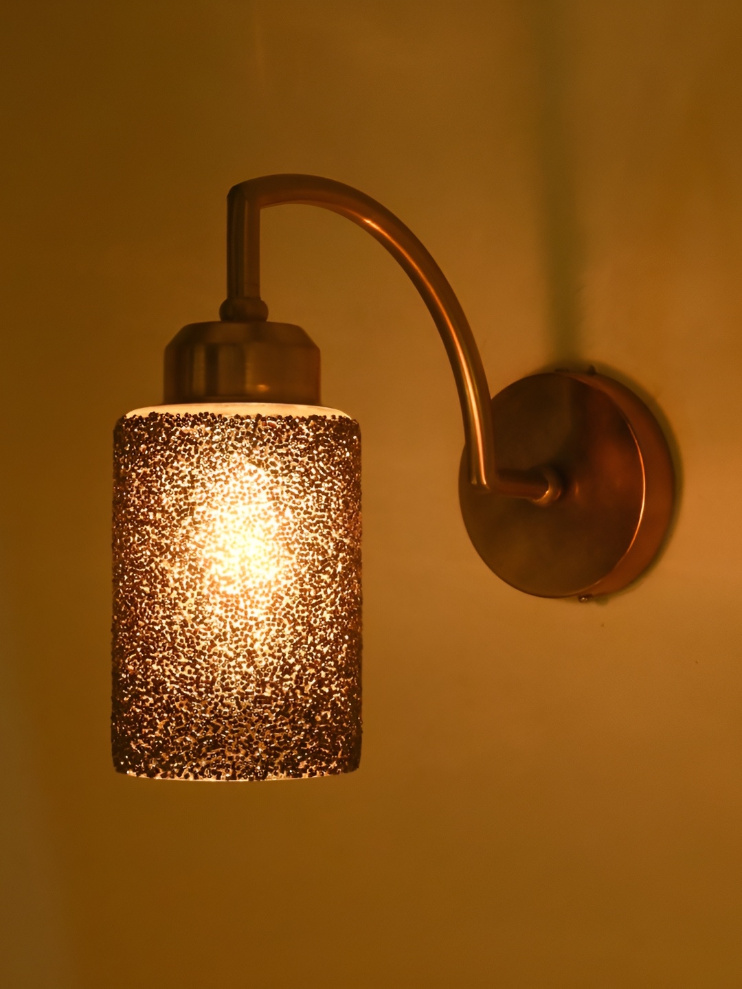 

Afast Black & Gold Toned Textured Glass Contemporary Cylinder Shaped Wall Lamp