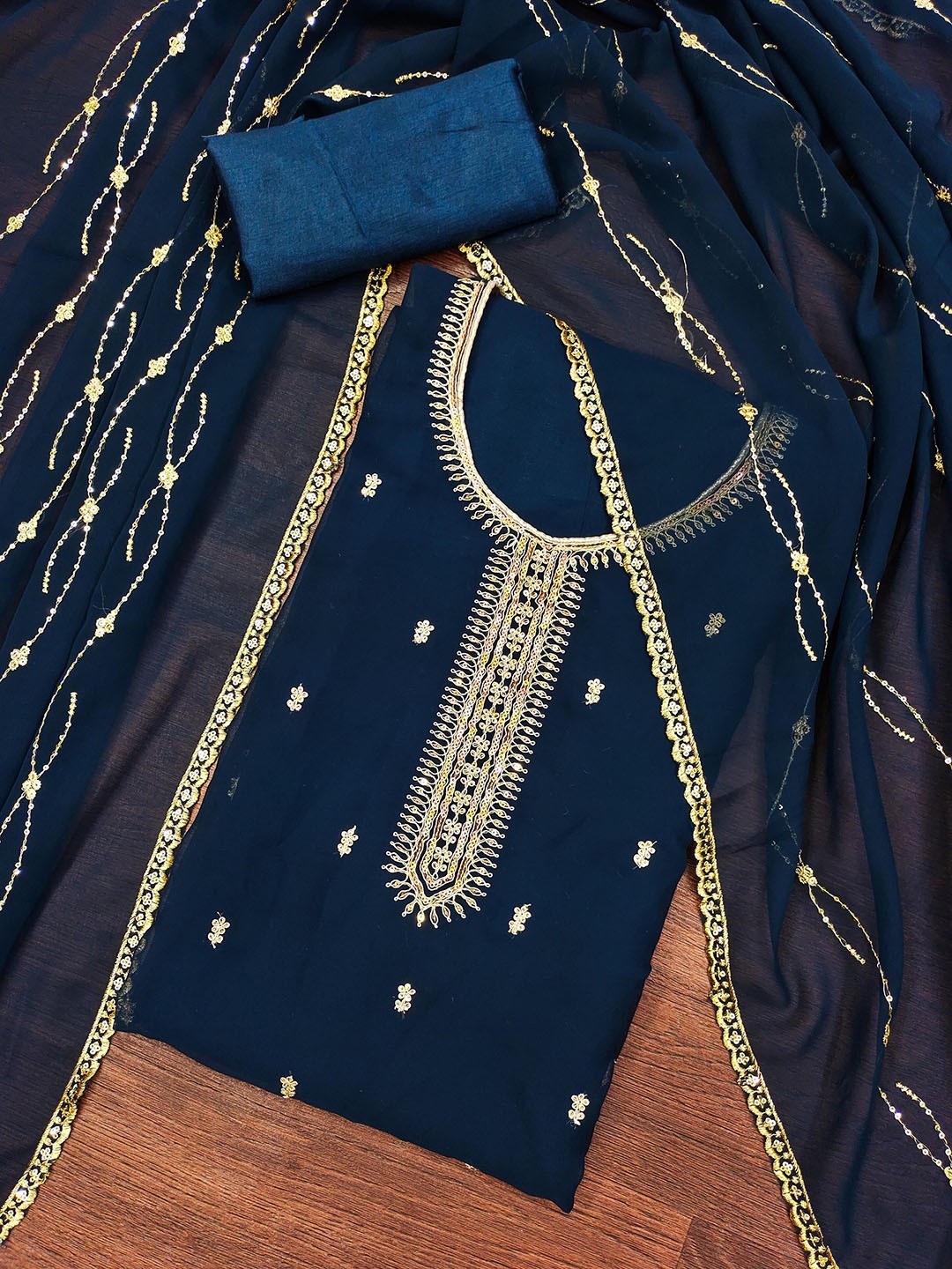 

Ishin Floral Embroidered Sequinned Silk Georgette Unstitched Dress Material, Blue