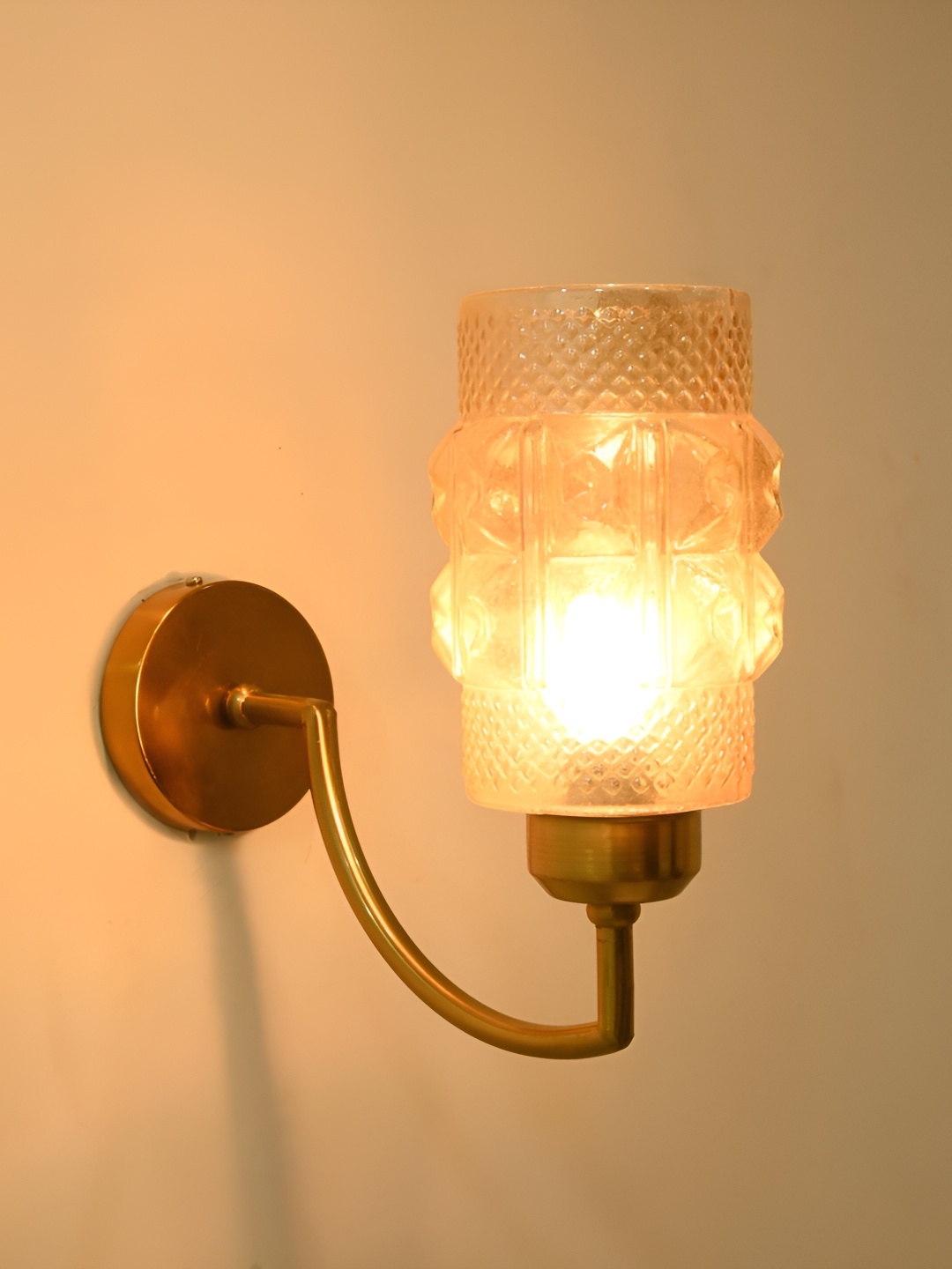 

Afast Gold-Toned Textured Glass Cylinder Shaped Wall Lamp