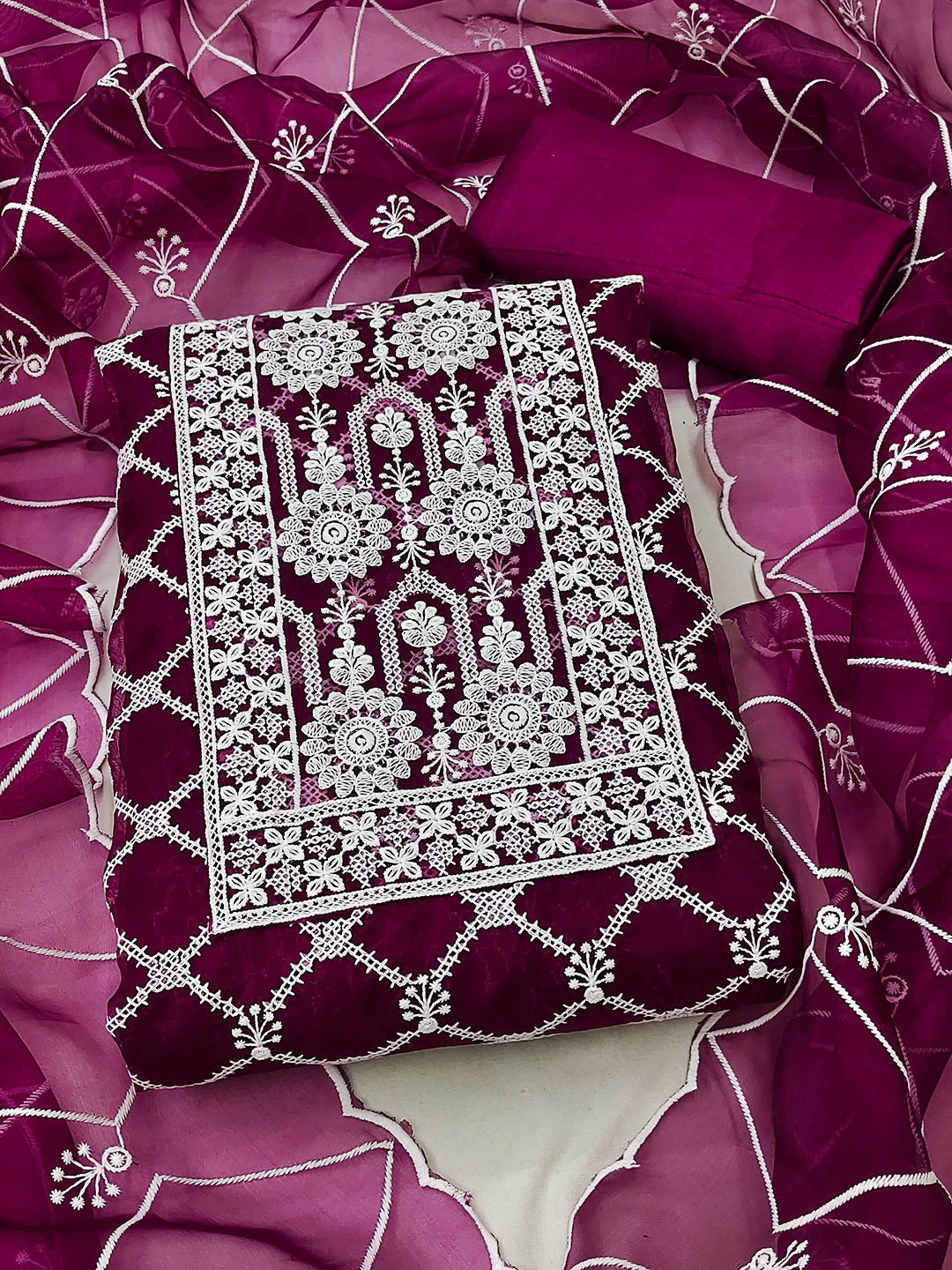 

Ishin Ethnic Motifs Embroidered Organza Unstitched Dress Material, Magenta