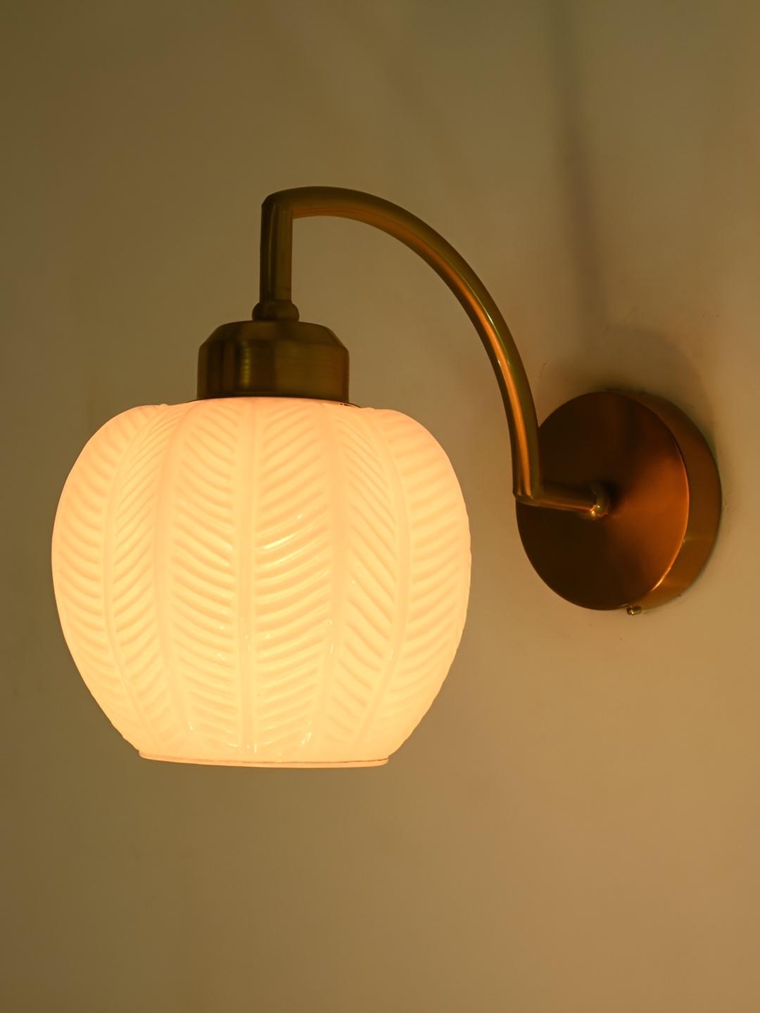 

Afast White & Gold Toned Textured Glass Cylinder Shaped Wall Lamp