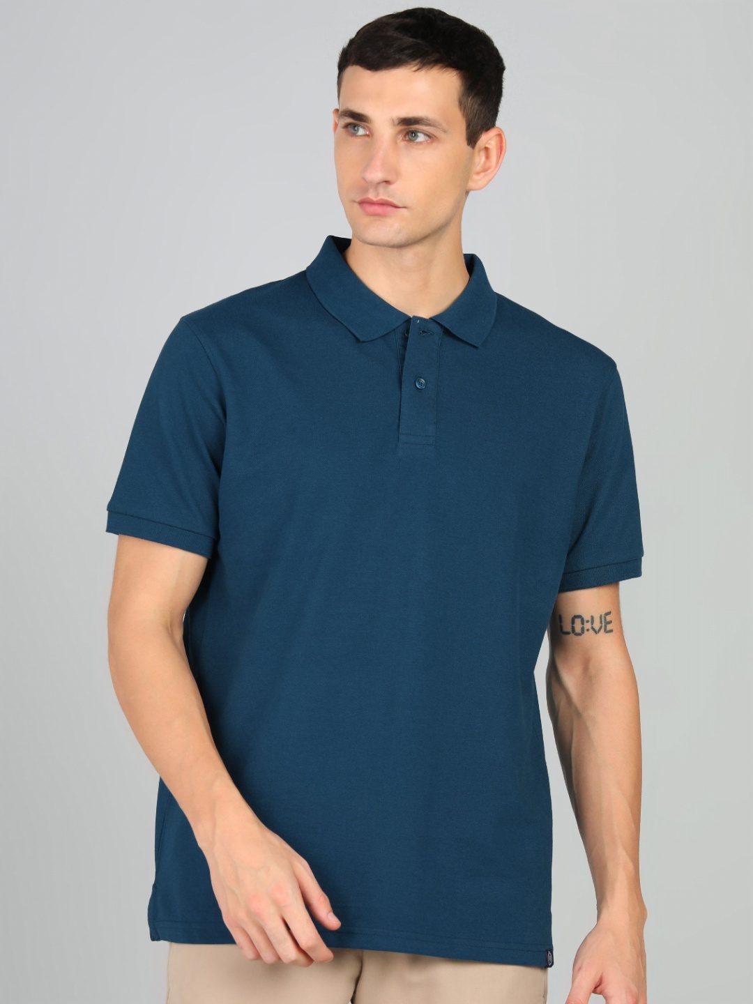 

Alan Jones Men Solid Polo Collar Cotton T-shirt, Blue