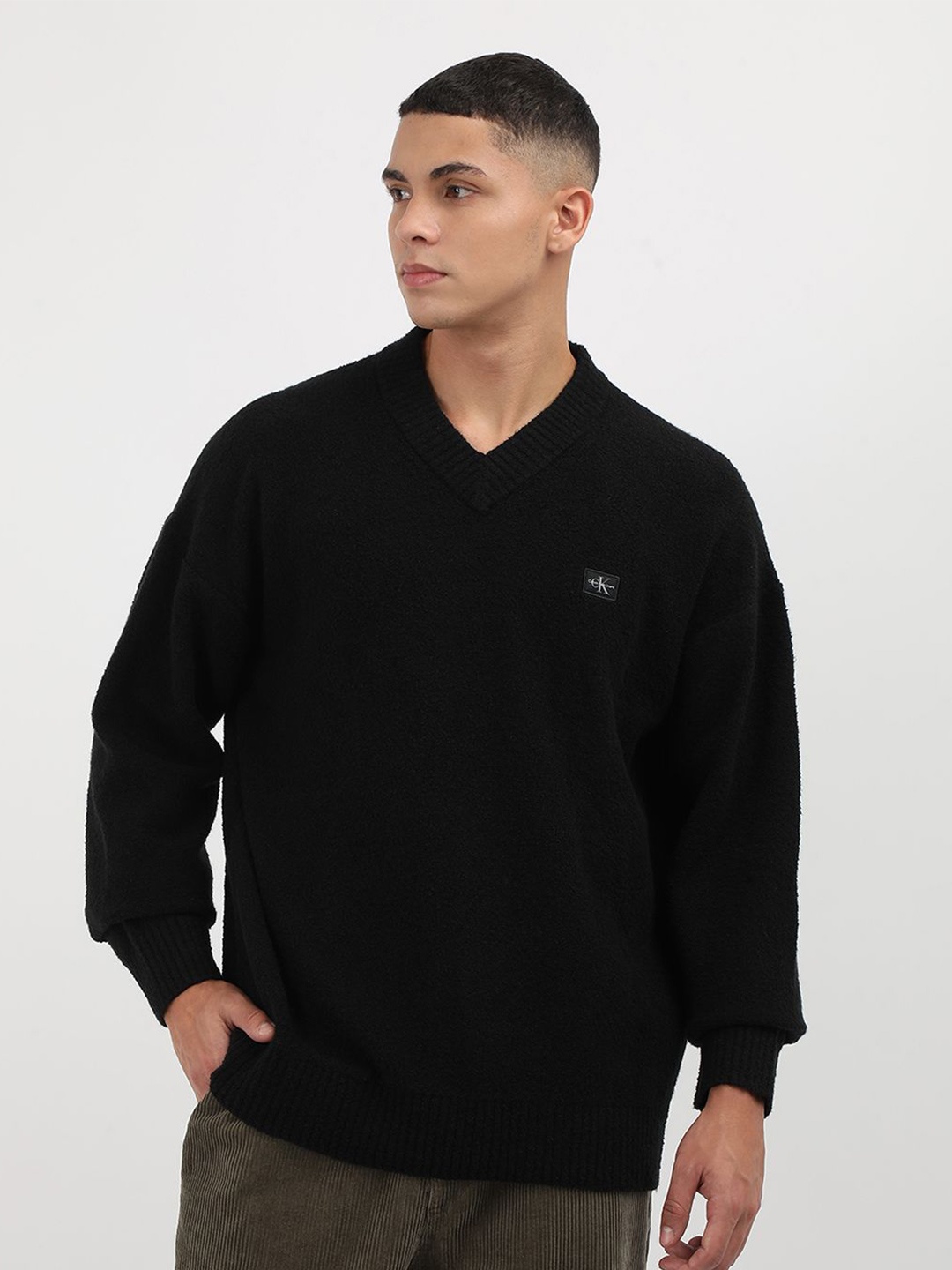 

Calvin Klein Jeans Men Solid Pullover, Black