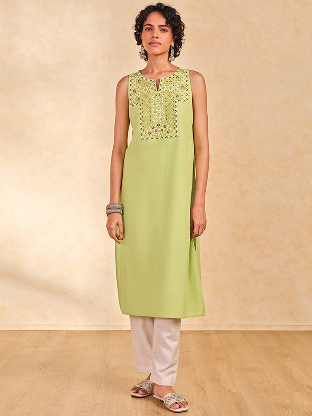 

Global Desi Geometric Yoke Design Sleeveless Notch Neck Thread Work Straight Kurta, Green