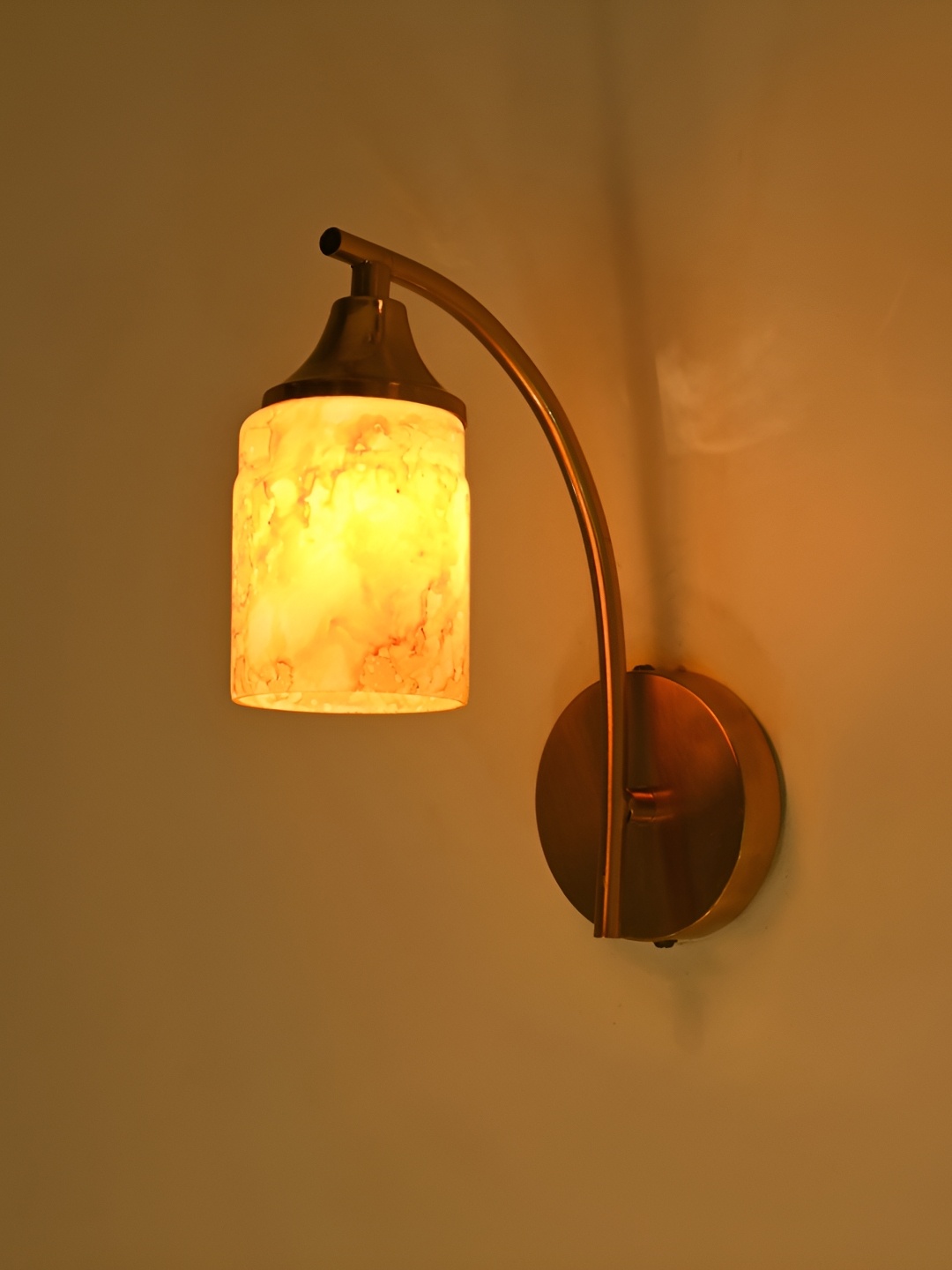 

Afast Yellow & Gold Toned Abstract Printed Glass Contemporary Cylinder Shaped Wall Lamp