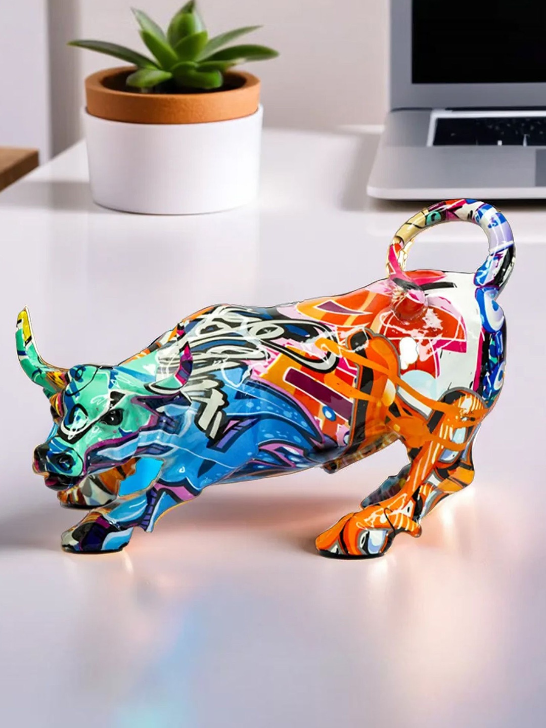 

Ekhasa Blue & White Abstract Printed Bull Figurine Showpiece