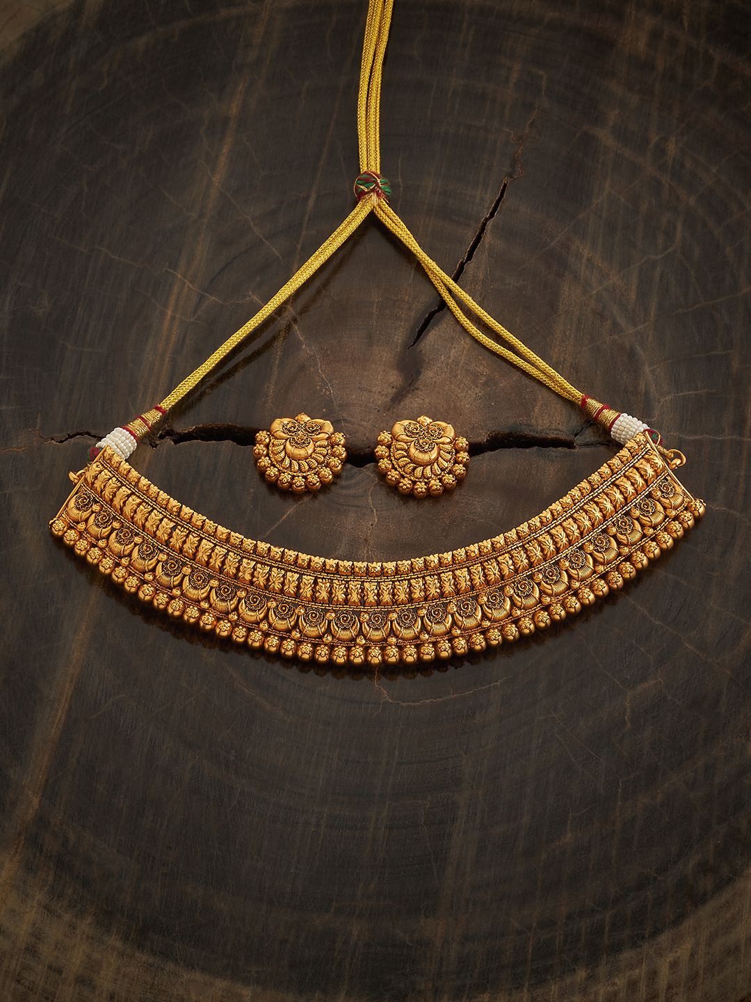 

Kushal's Fashion Jewellery Gold-Plated Antique Necklace and Earrings