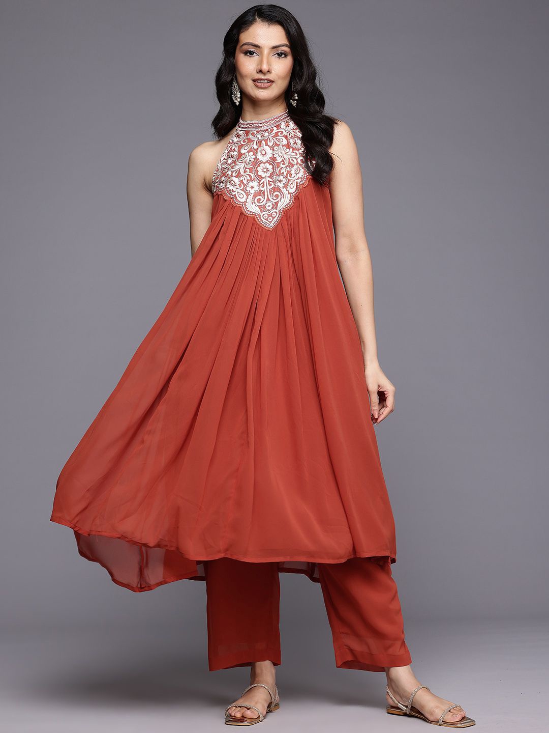 

Varanga Floral Yoke Design Thread Work Pleated Silk Georgette A-Line Kurta with Trousers, Rust