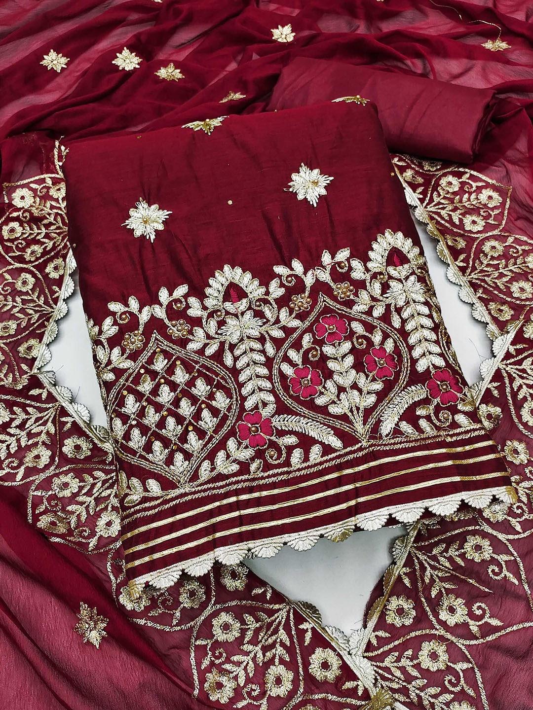 

Ishin Ethnic Motifs Embroidered Thread Work Unstitched Dress Material, Maroon