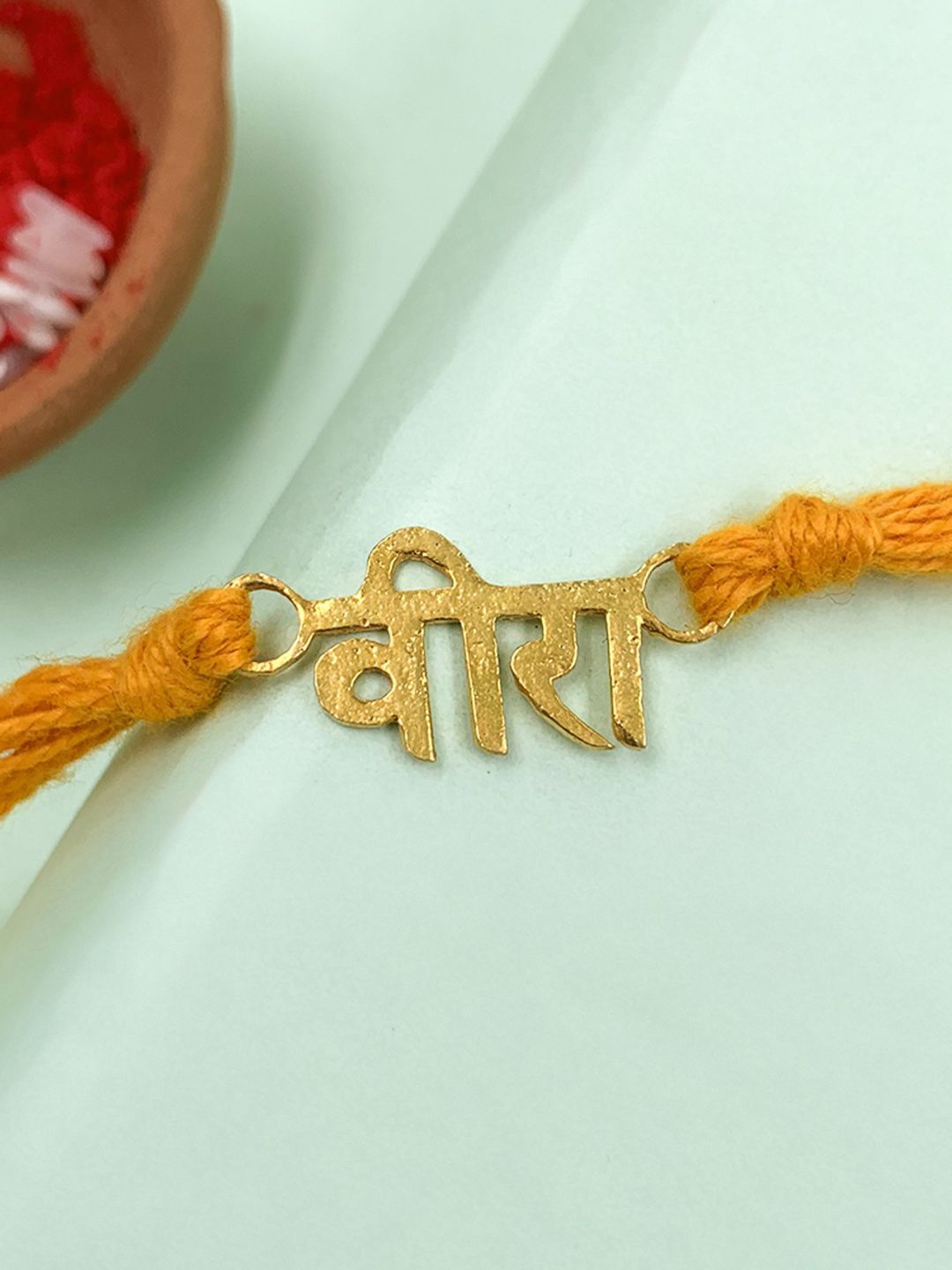 

Unniyarcha Thread Rakhi, Gold