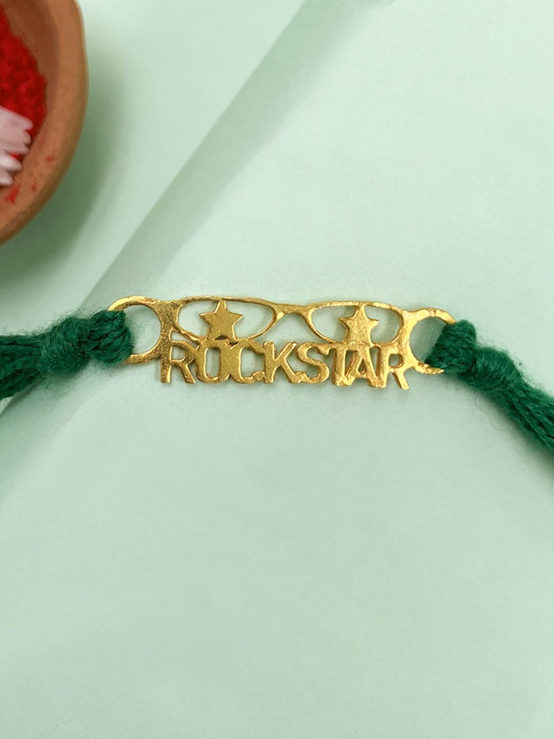 

Unniyarcha Thread Rakhi, Gold