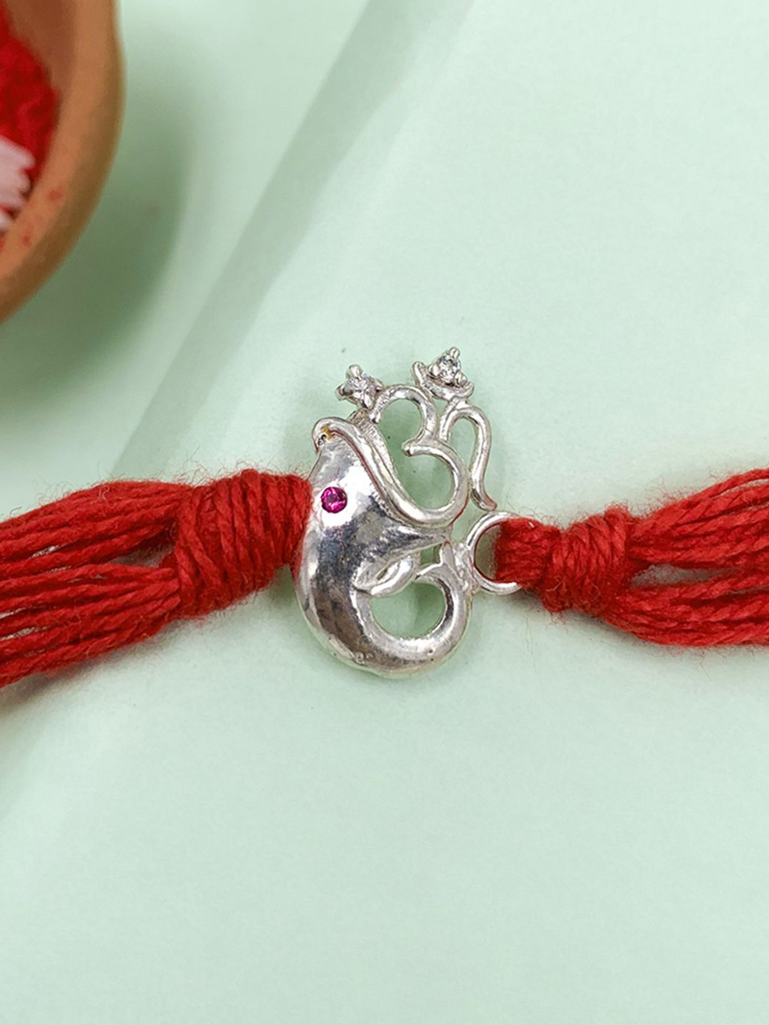 

Unniyarcha Thread Rakhi, Silver