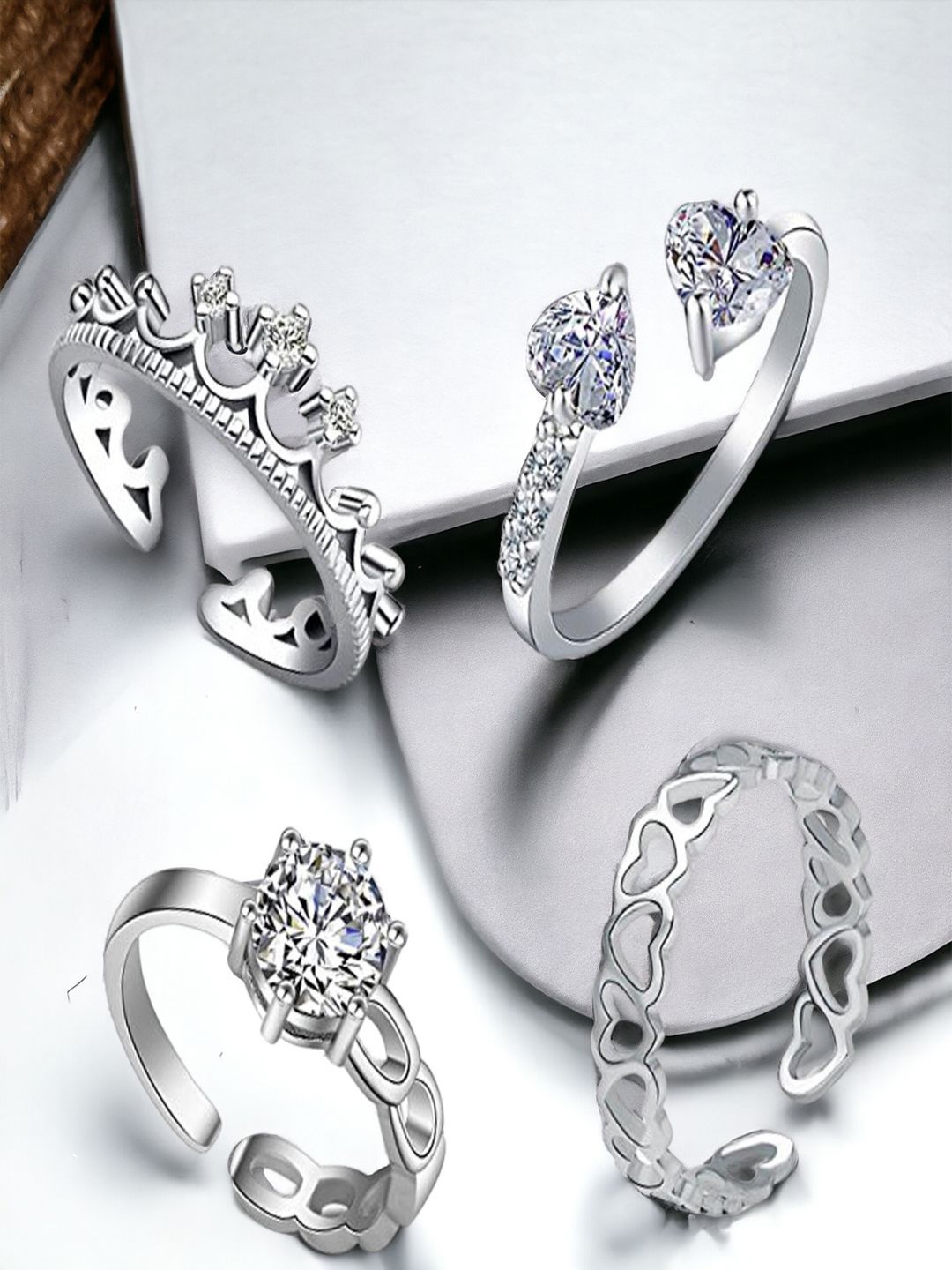 

Okos Set Of 4 Rhodium-Plated Cubic Zirconia-Studded Graceful Finger Rings, Silver