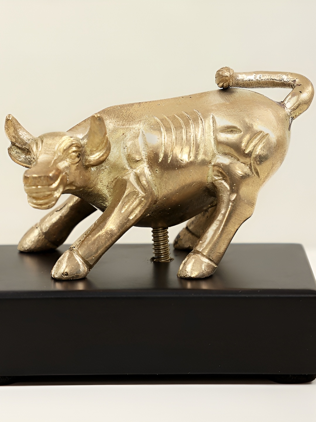 

Exotic India Gold-Toned & Black Bull as Seen on Wall Street Brass Idol Showpiece