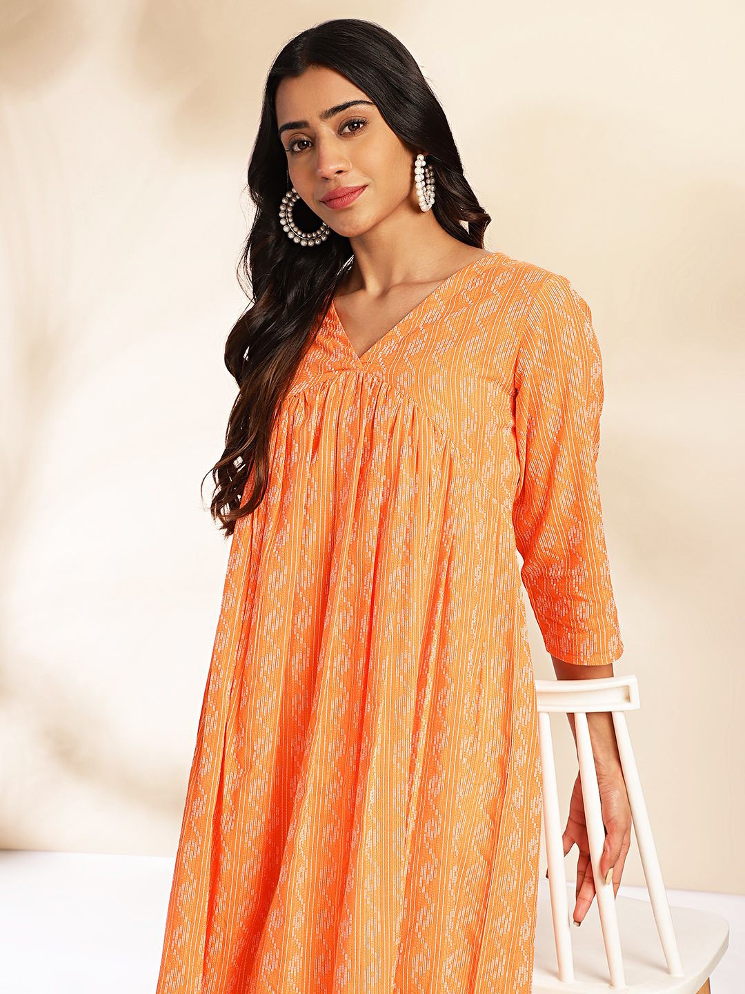 

Janasya Geometric Pure Cotton Woven Design Gathered Kurta, Orange