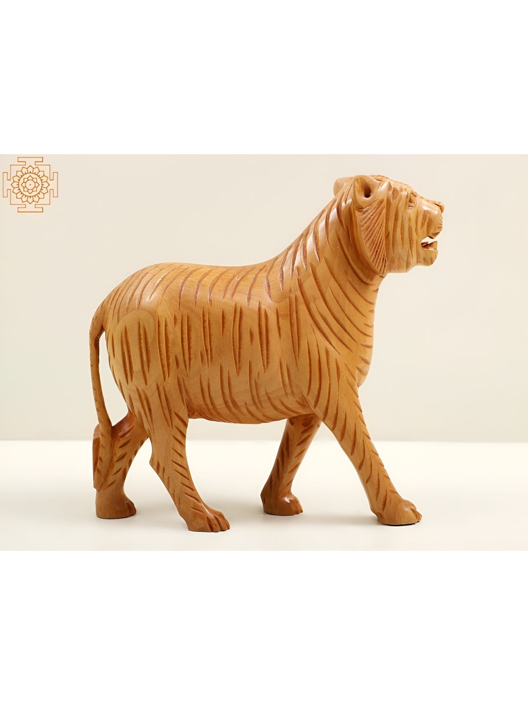 

Exotic India Yellow Wooden Idol Showpiece