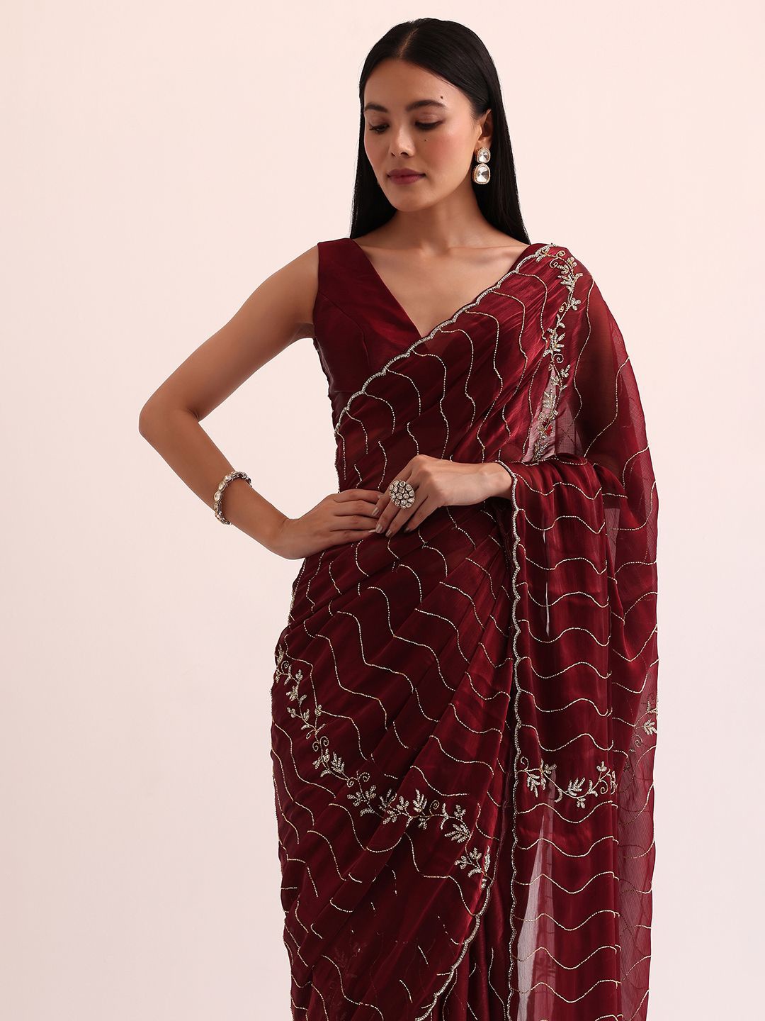 

KALKI Fashion Embellished Embroidered Tissue Saree, Red