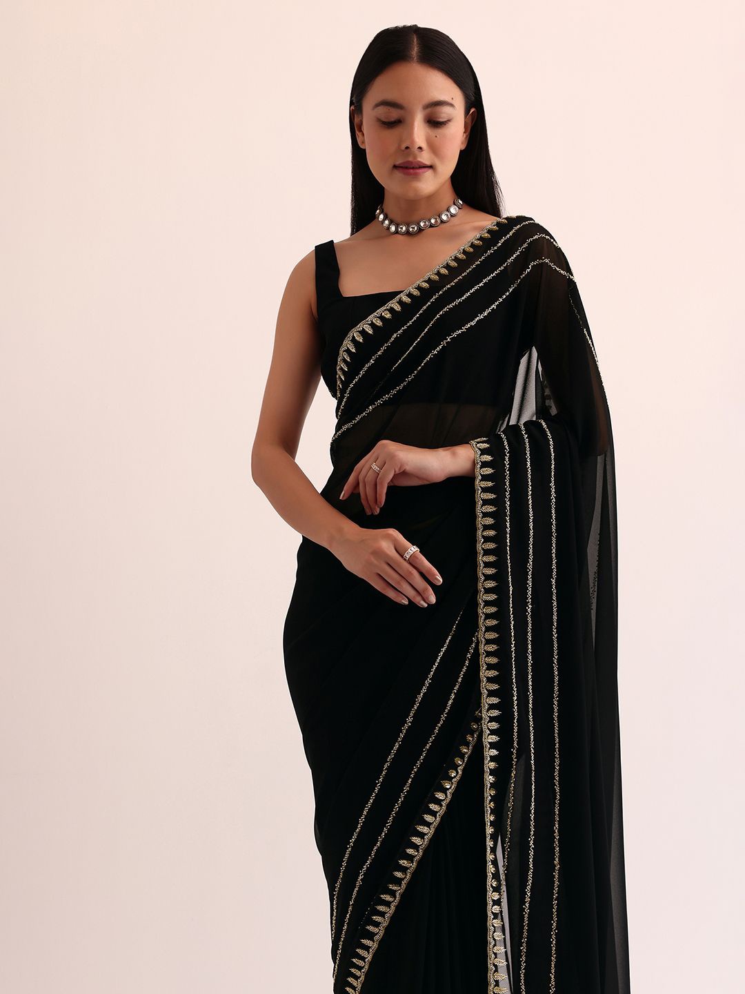 

KALKI Fashion Embellished Embroidered Pure Georgette Zari Saree, Black