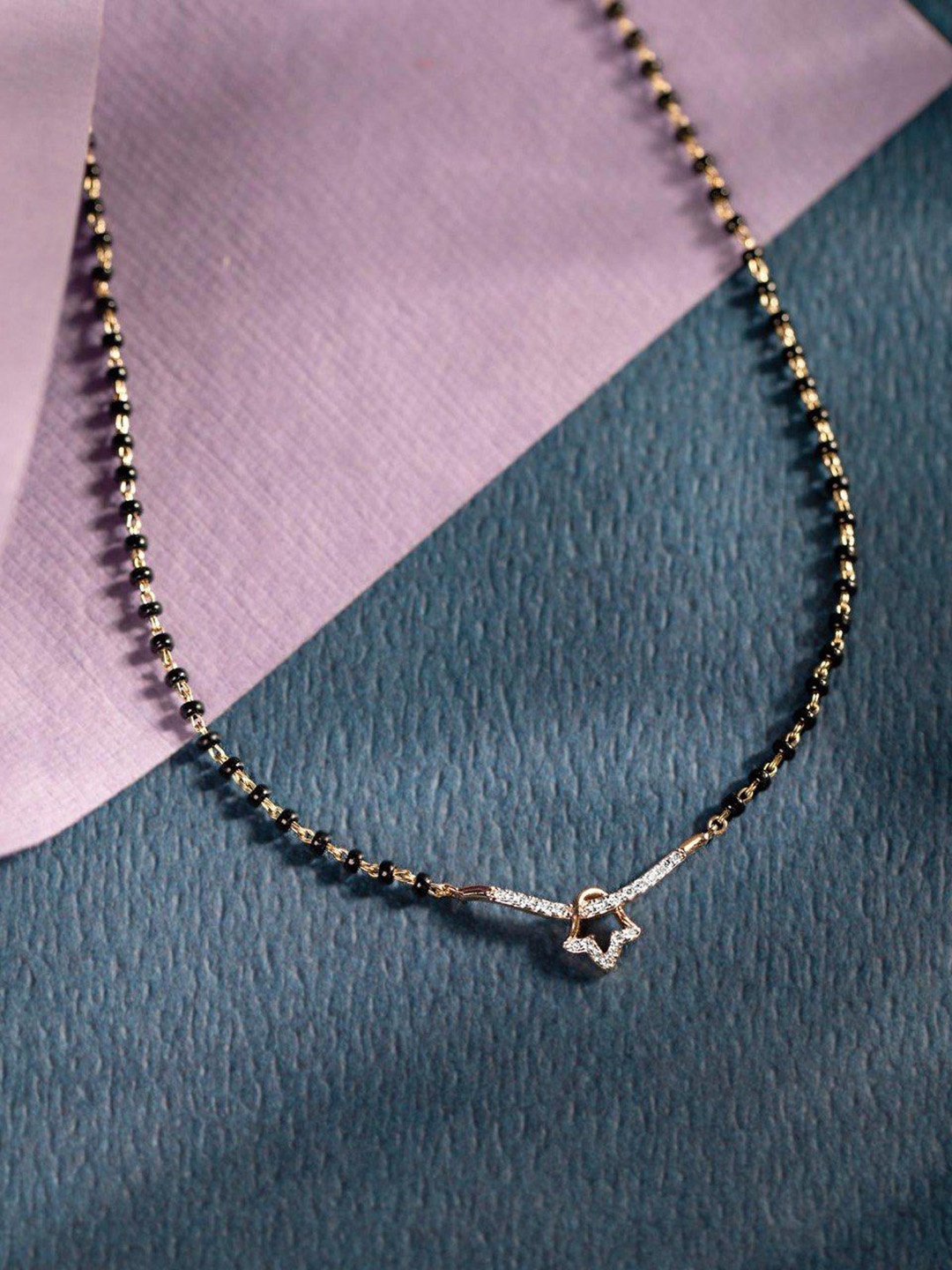 

HETPRIT Gold-Plated American Diamond Studded and Beaded Mangalsutra