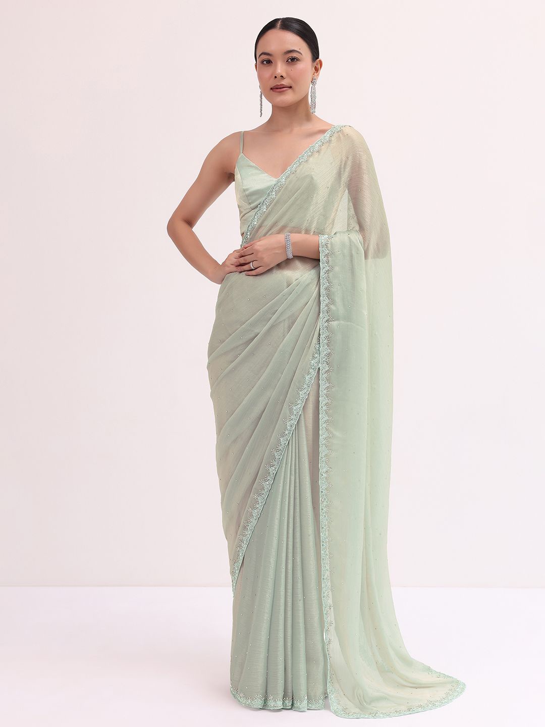 

KALKI Fashion Floral Sequinned Silk Blend Green Saree