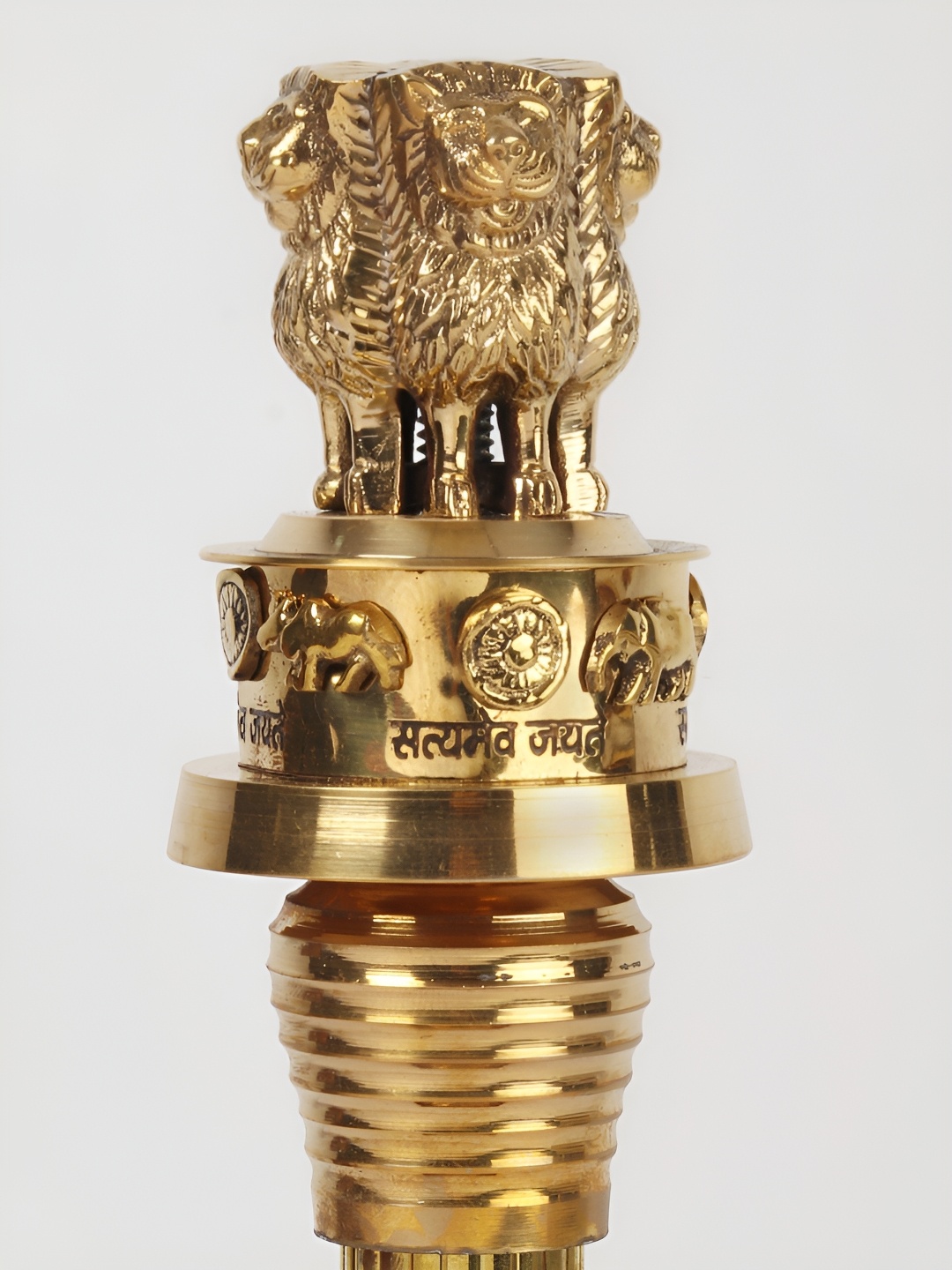 

Exotic India Gold-Toned Ashoka Stambh Brass Idol Showpiece
