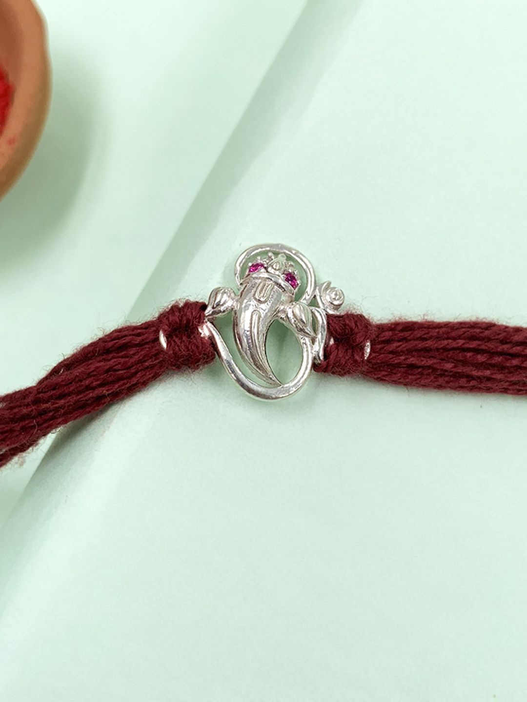 

Unniyarcha Pure 92.5 Ganesh & Om Silver Thread Rakhi