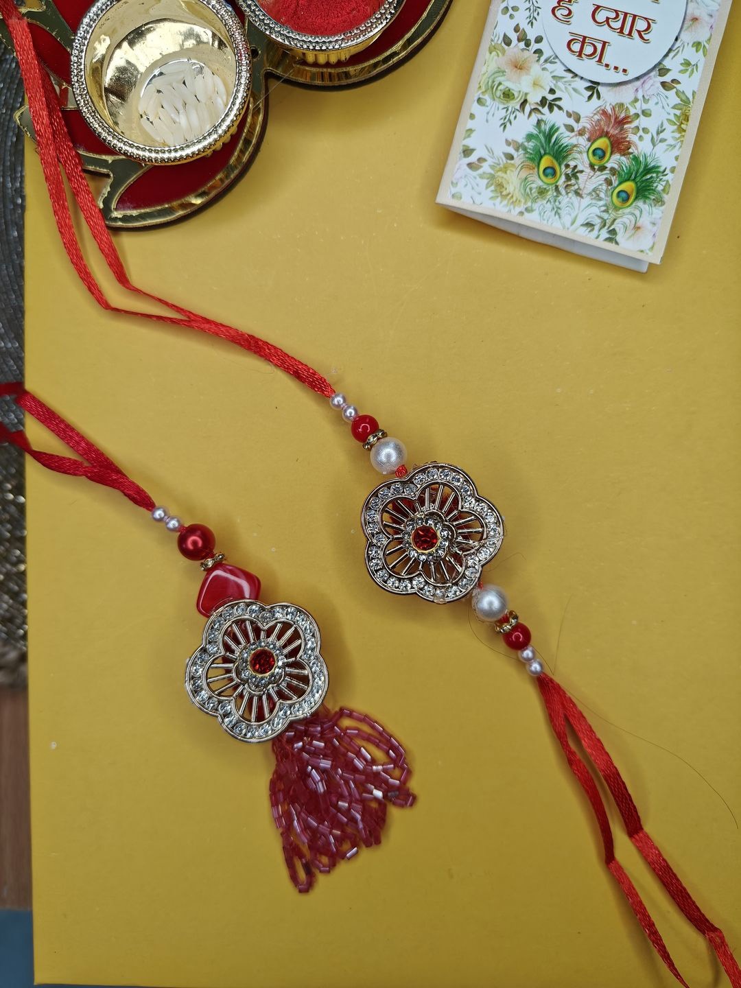 

NVR Stone Studed & Beaded Bhaiya Bhabhi Thread Rakhi With Roli Chawal, Red