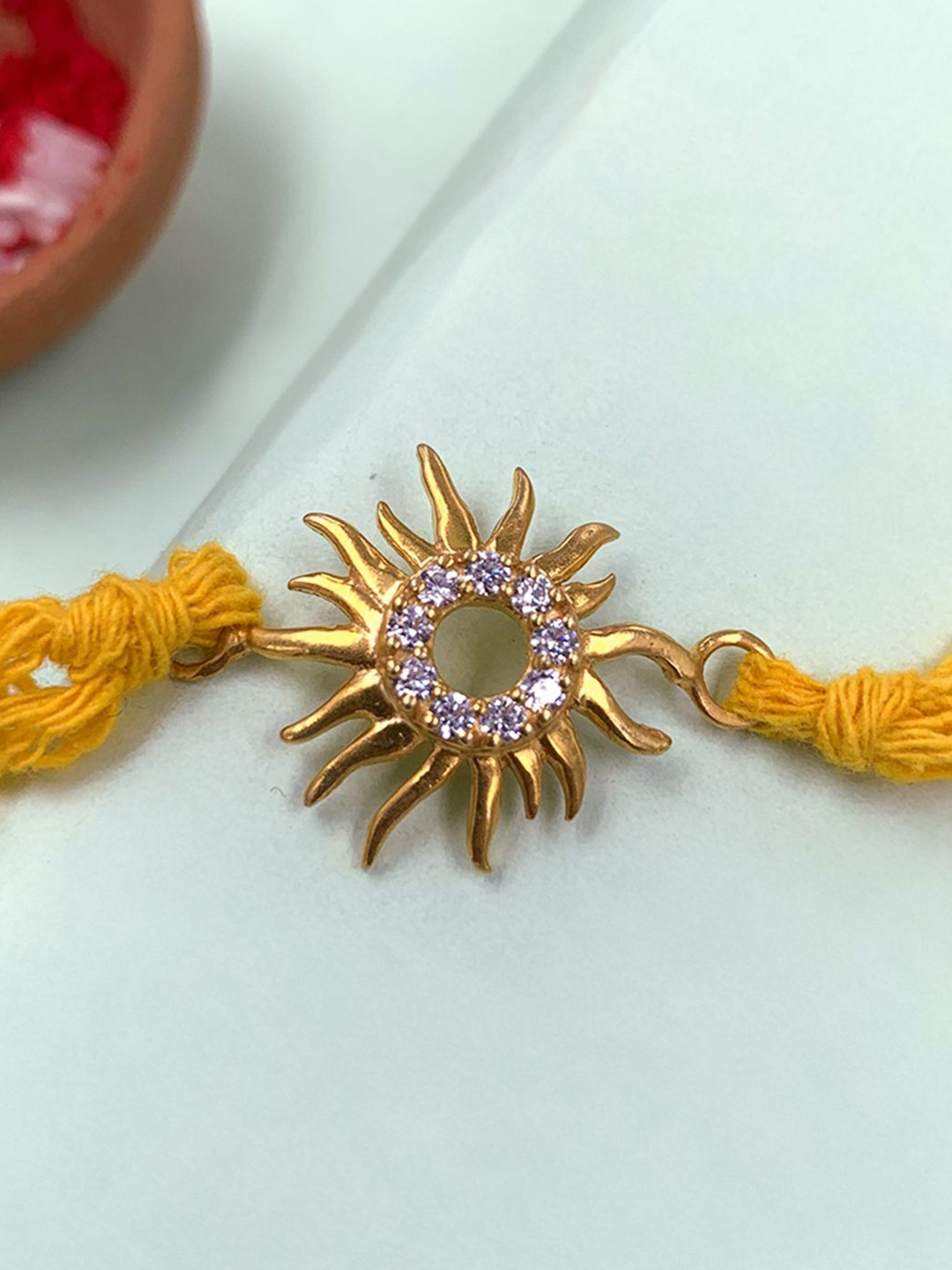 

Unniyarcha 92.5 Sterling Silver Sun Rakhi Thread Rakhi, Yellow