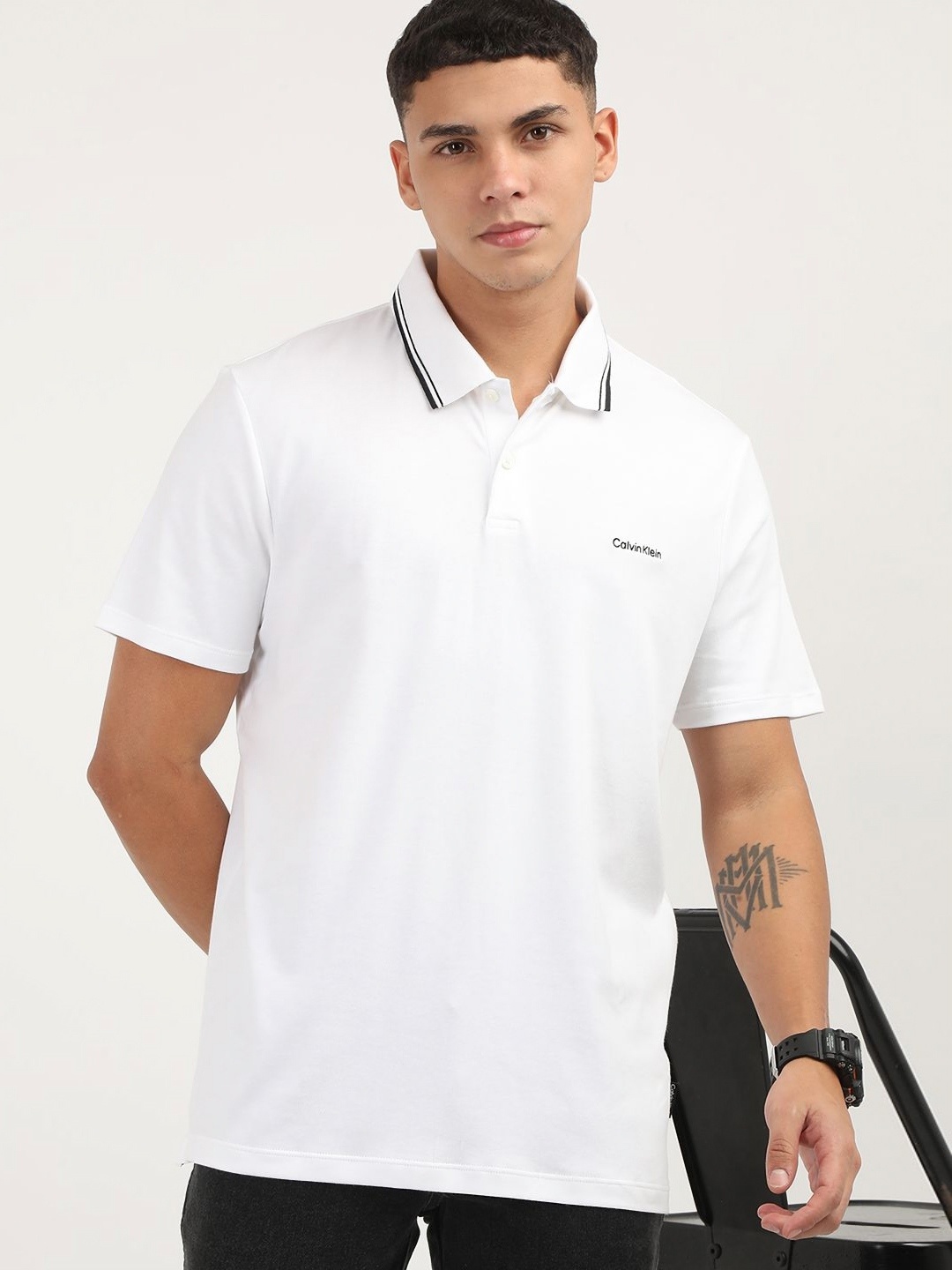 

Calvin Klein Jeans Men Polo Collar Extended Sleeves Pockets T-shirt, White
